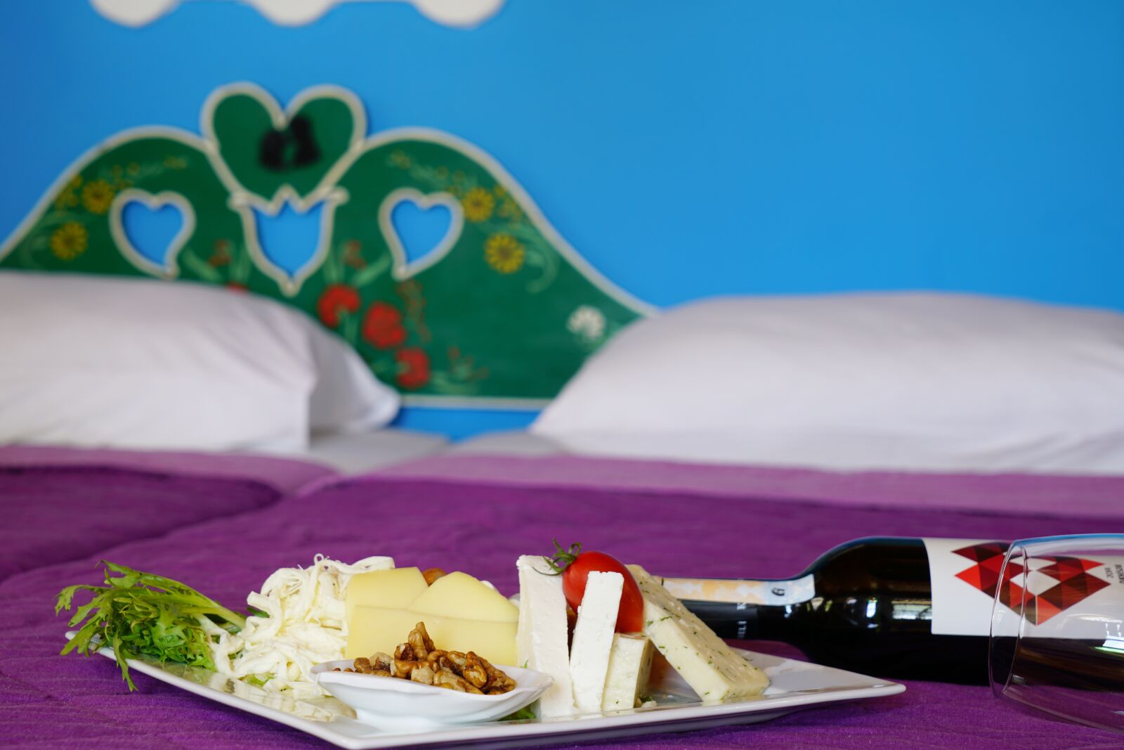 Sony a7R II sample photo. Cheese, plate, bed photography