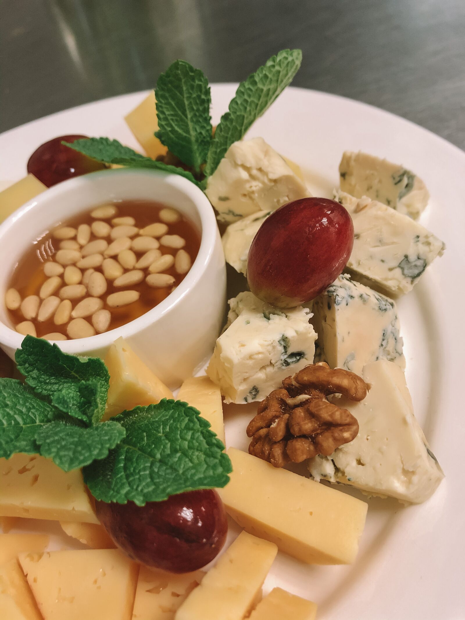 iPhone 8 back camera 3.99mm f/1.8 sample photo. Restaurant, cheese, food photography