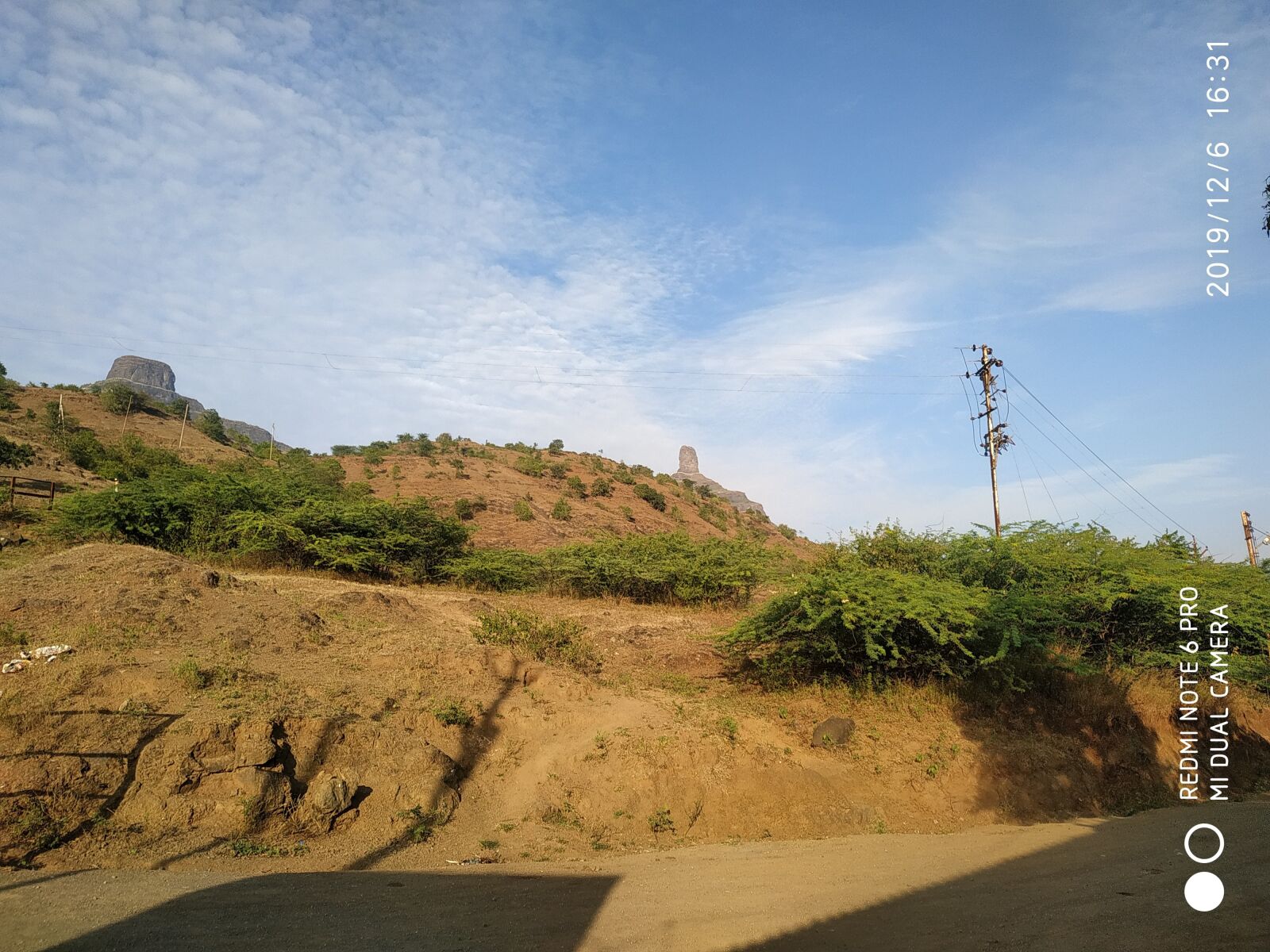 Xiaomi Redmi Note 6 Pro sample photo. Hill, sky, shadow photography