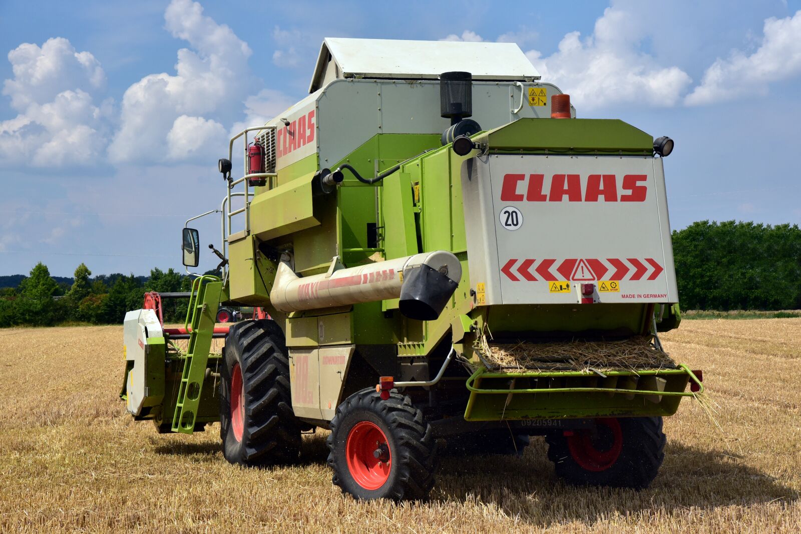 Nikon D750 sample photo. Harvester, grain harvest, field photography