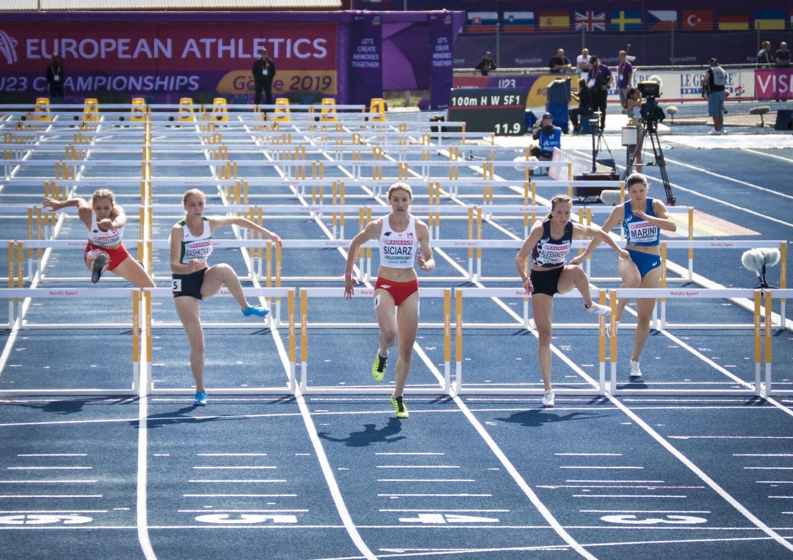 Nikon D3200 sample photo. Running, hurdles, athletics photography