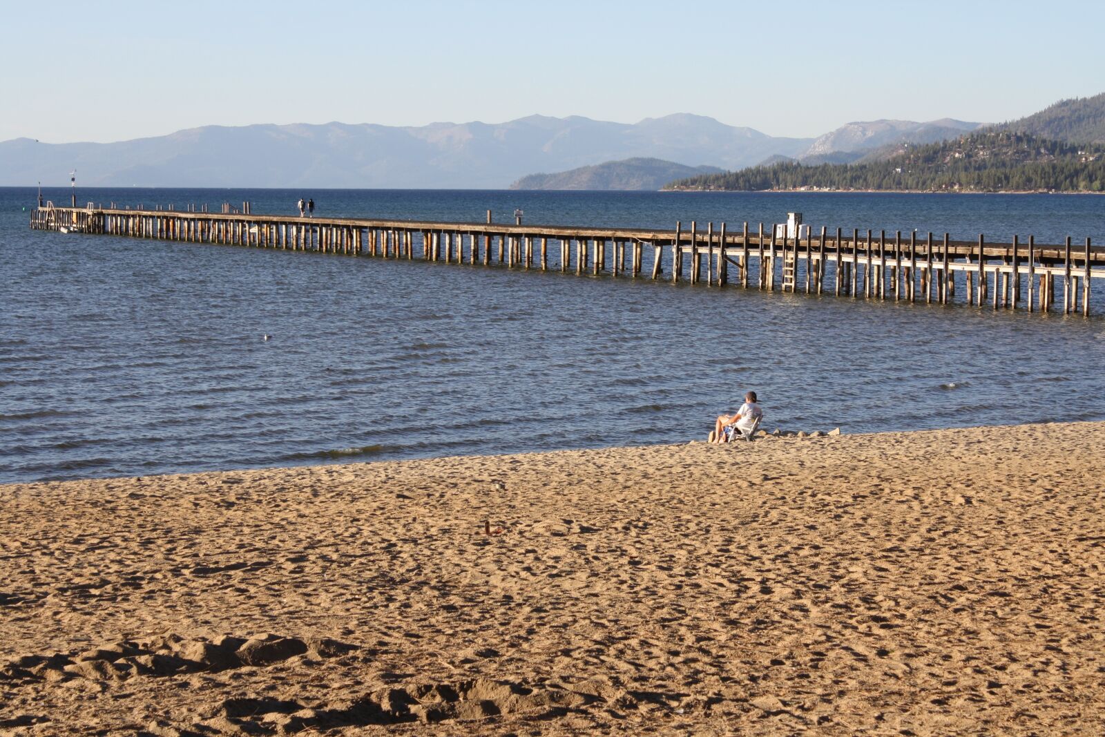 Canon EOS 1000D (EOS Digital Rebel XS / EOS Kiss F) sample photo. Pier, lake, sand photography