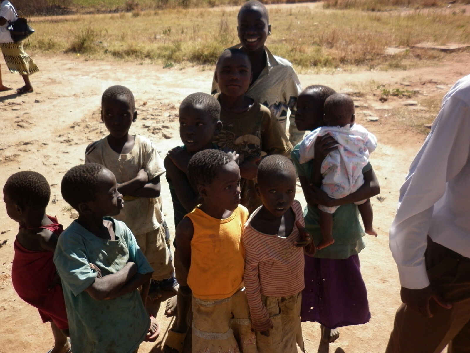 Panasonic DMC-F3 sample photo. Africa, children, kids, poverty photography