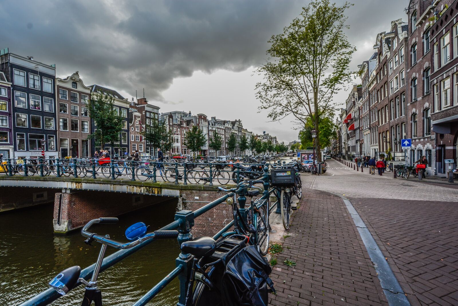 Nikon D5200 sample photo. Amsterdam, storm, bicycles photography