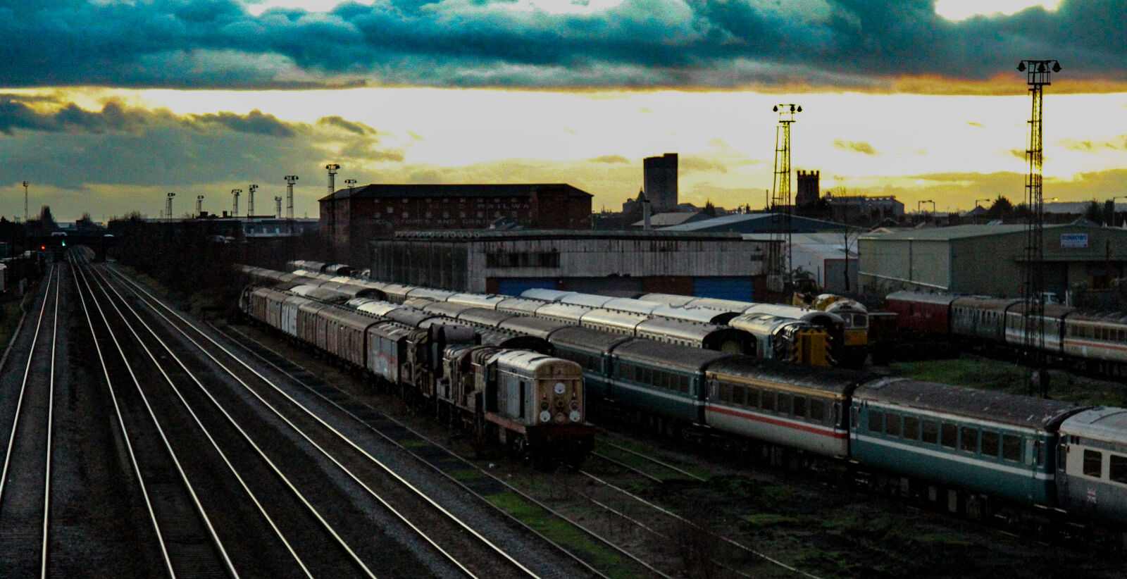 Canon EF 24-105mm F4L IS USM sample photo. Carriages, clouds, parallel, lines photography