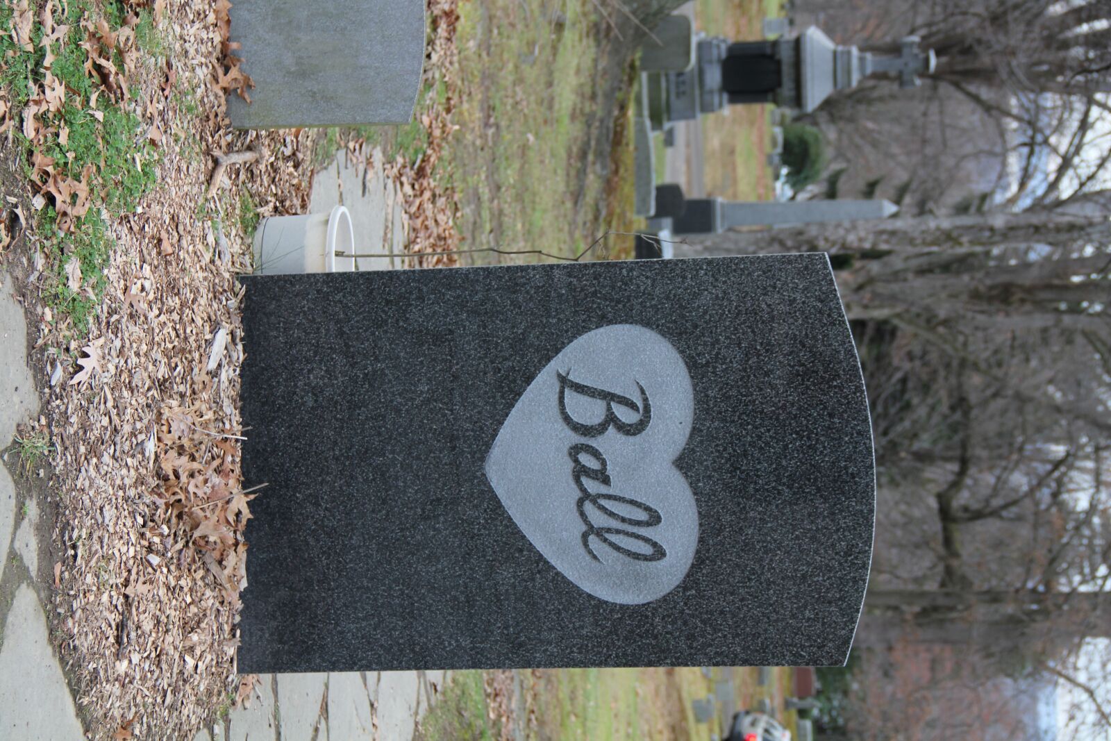 Canon EF-S 18-135mm F3.5-5.6 IS sample photo. Grave, cemetary, gravestone photography