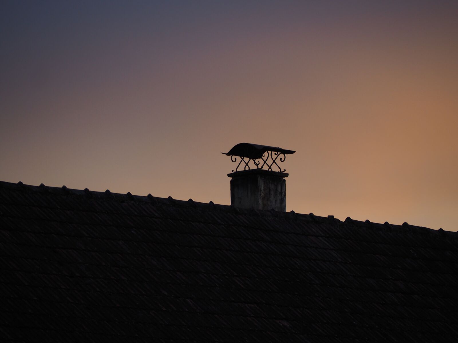 Olympus OM-D E-M10 sample photo. Flue, sunset, roof photography