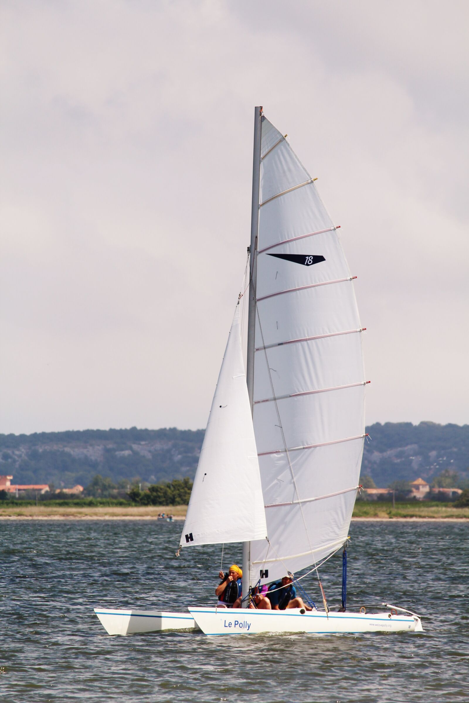 Canon EF-S 55-250mm F4-5.6 IS STM sample photo. Sailboat, boat, sea photography