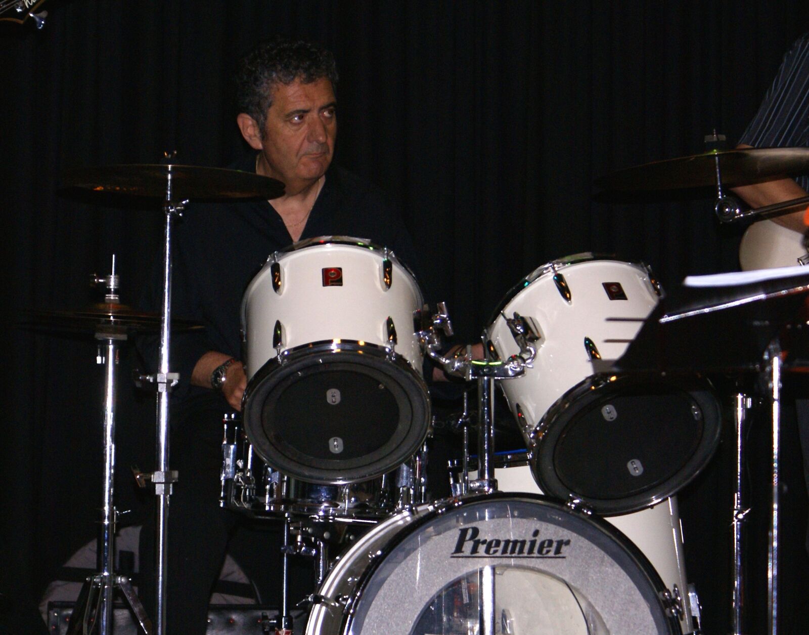 Sony Alpha DSLR-A100 sample photo. Drummer, rock band, local photography