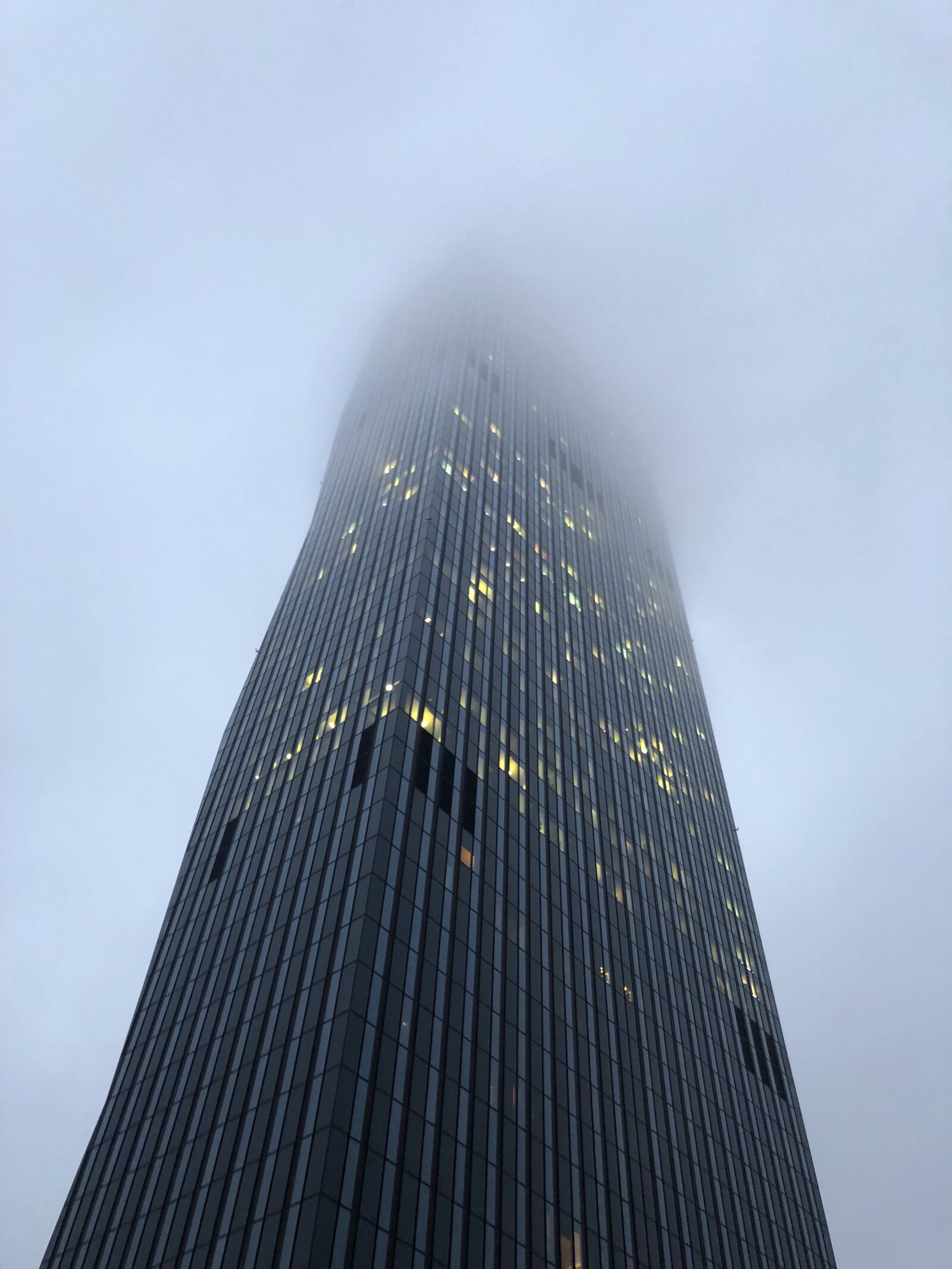 iPhone X back dual camera 4mm f/1.8 sample photo. Skyscraper, fog, building photography