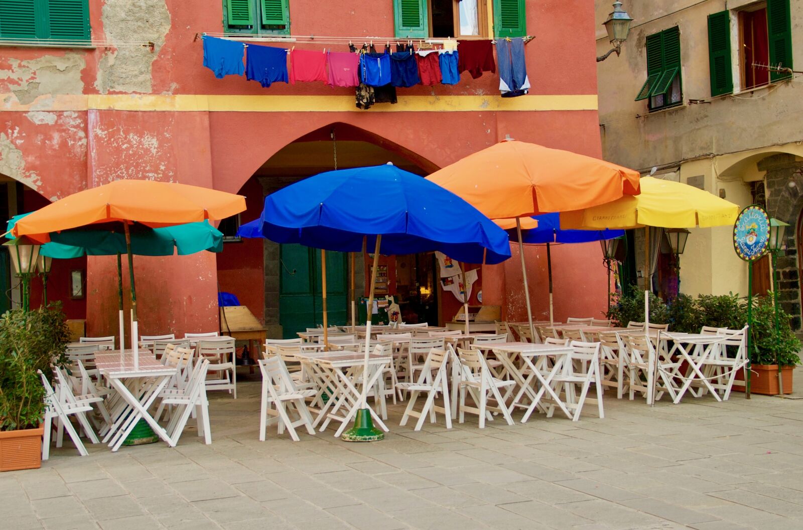 Nikon D200 sample photo. Umbrella, chair, summer photography