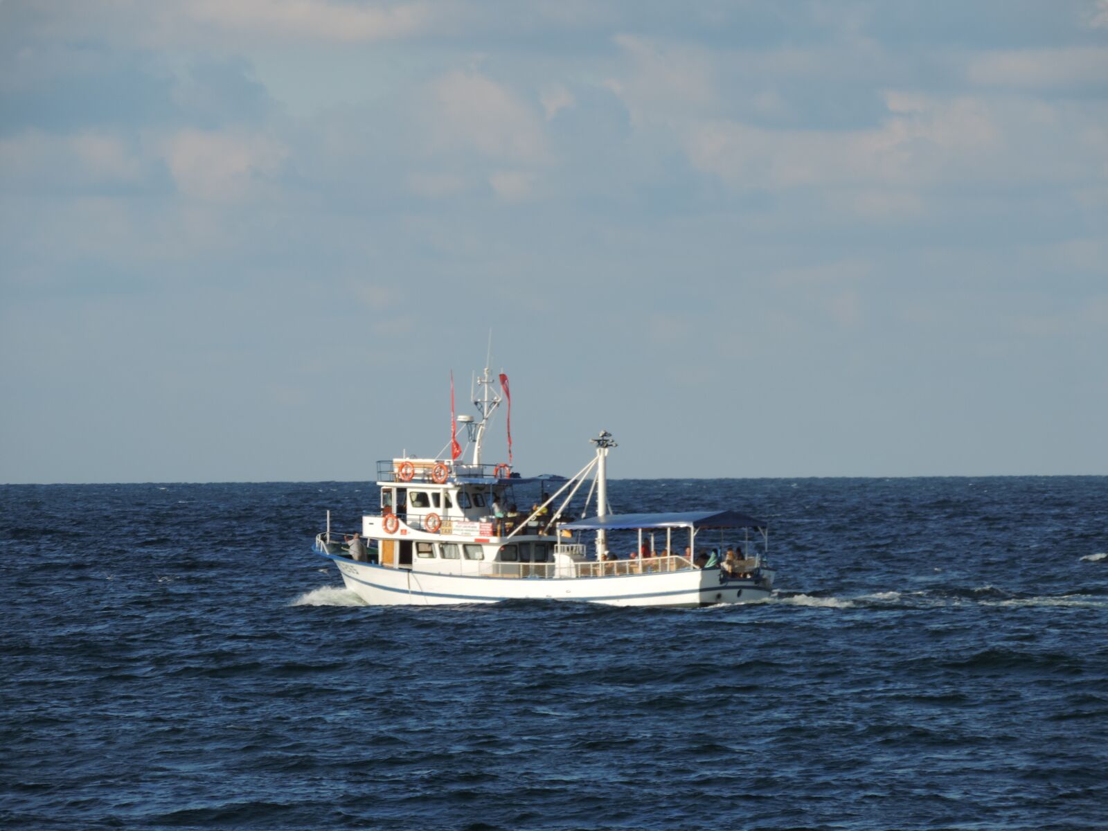 Nikon Coolpix P520 sample photo. Blue, boat, sea photography