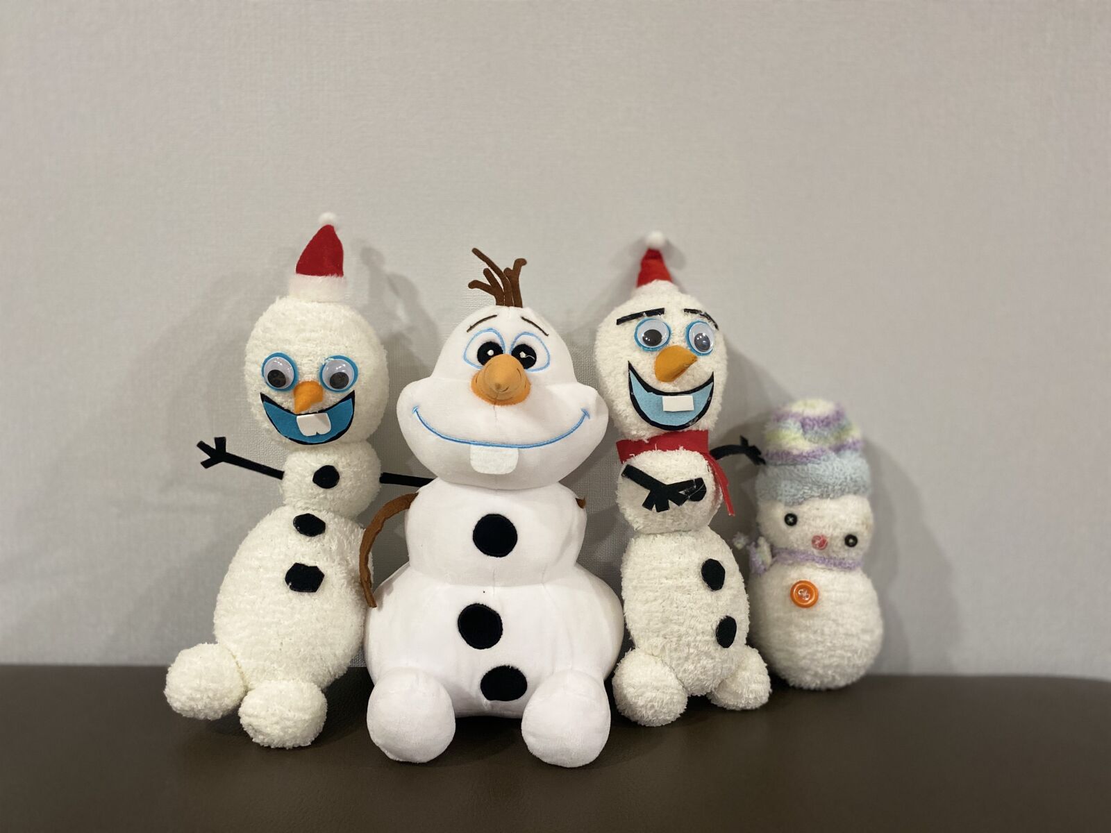 Apple iPhone 11 Pro + iPhone 11 Pro back dual wide camera 4.25mm f/1.8 sample photo. Snowman, doll, winter photography