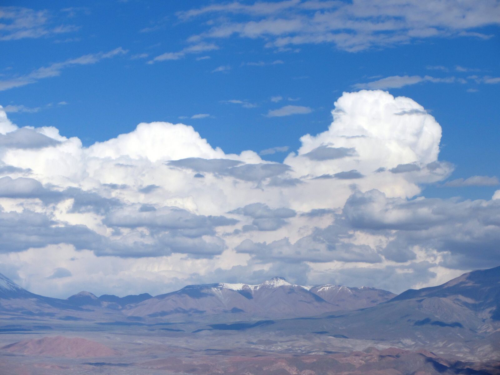 Canon PowerShot SX220 HS sample photo. Clouds, mountains, blue photography
