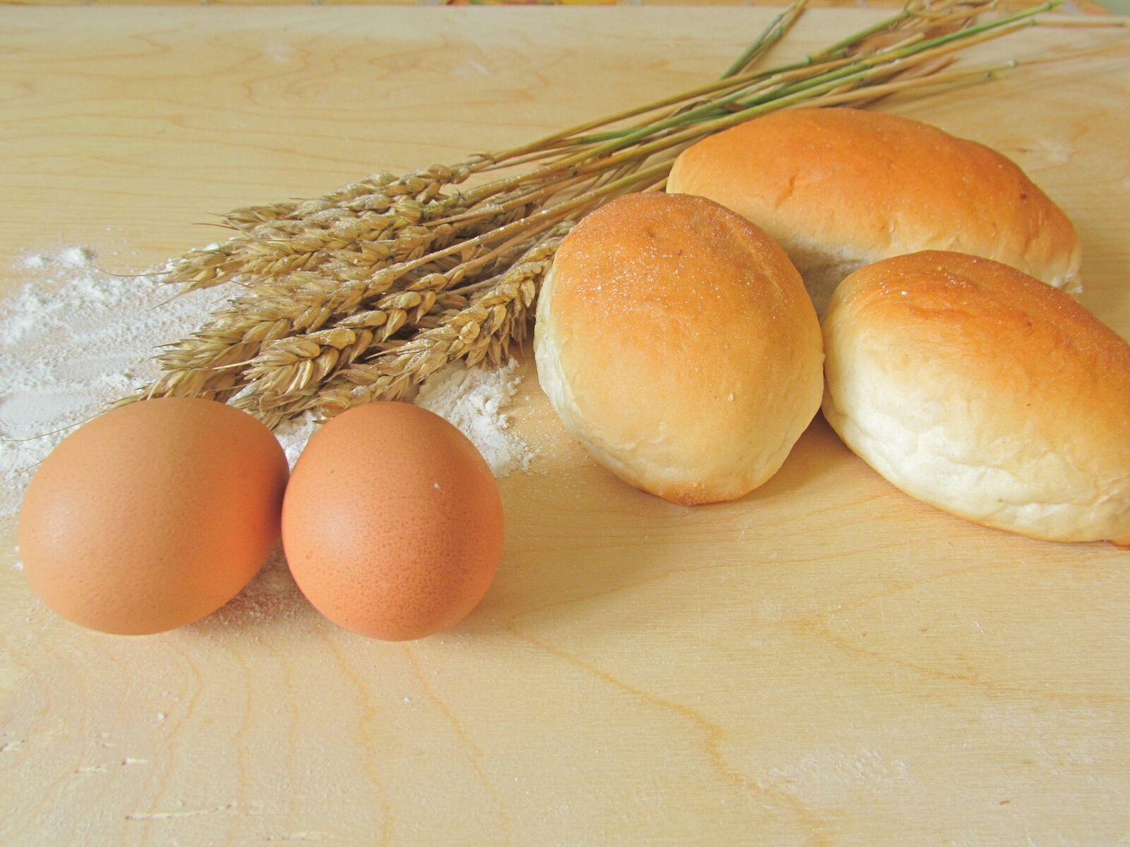Canon PowerShot SX150 IS sample photo. Buns, eggs, rye photography
