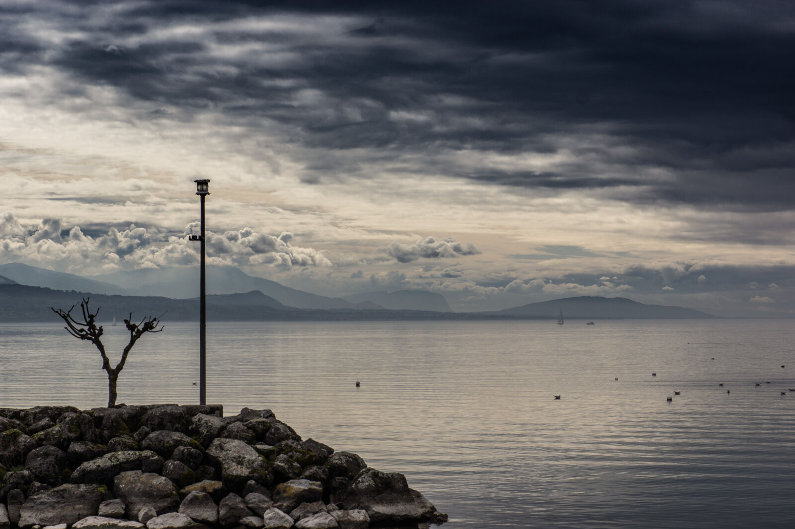 Sigma 70mm F2.8 EX DG Macro sample photo. Clouds, cloudy, lacleman, lake photography