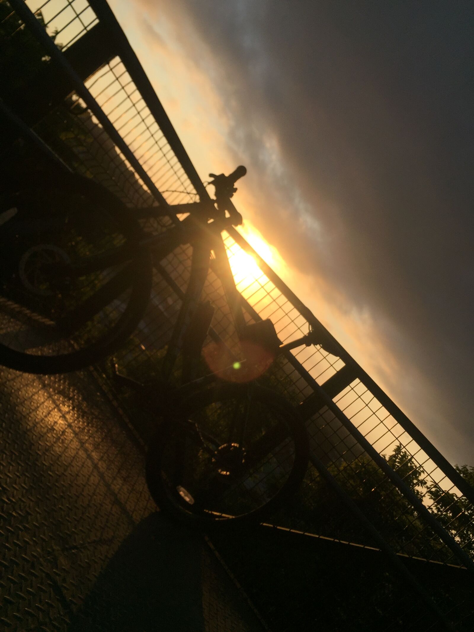 iPhone 6 back camera 4.15mm f/2.2 sample photo. Sunset, sky, bike photography