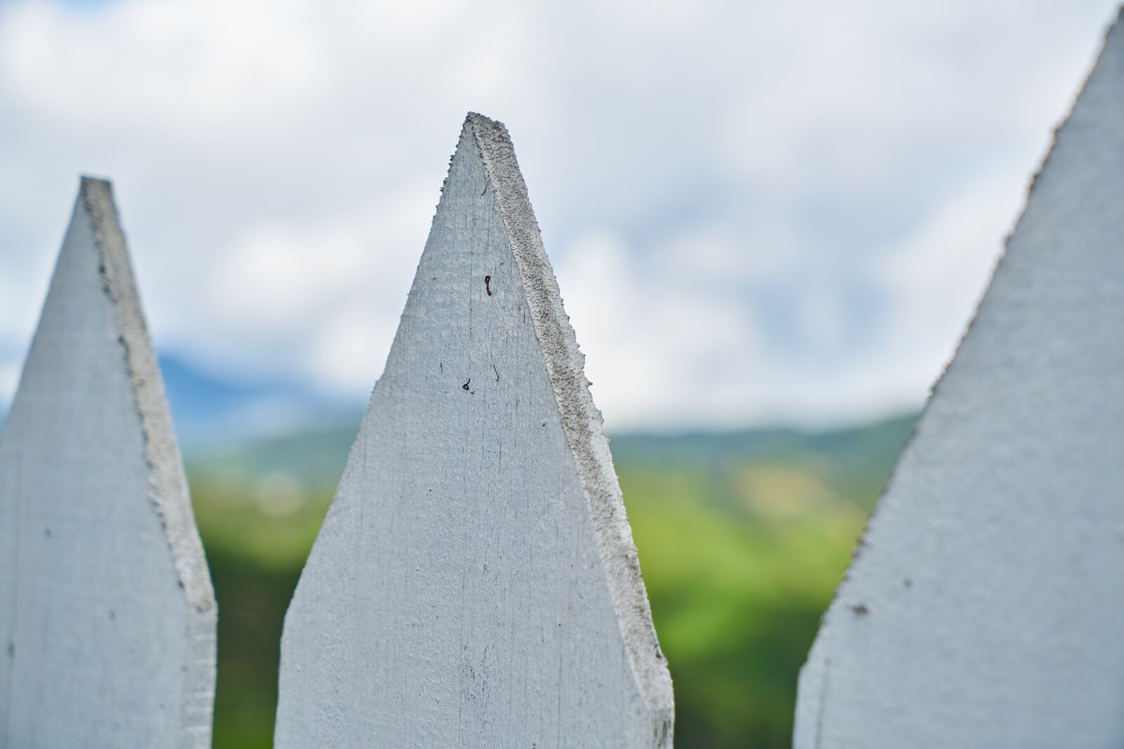 Sony a7R II sample photo. Fence, wood-fibre boards, white photography
