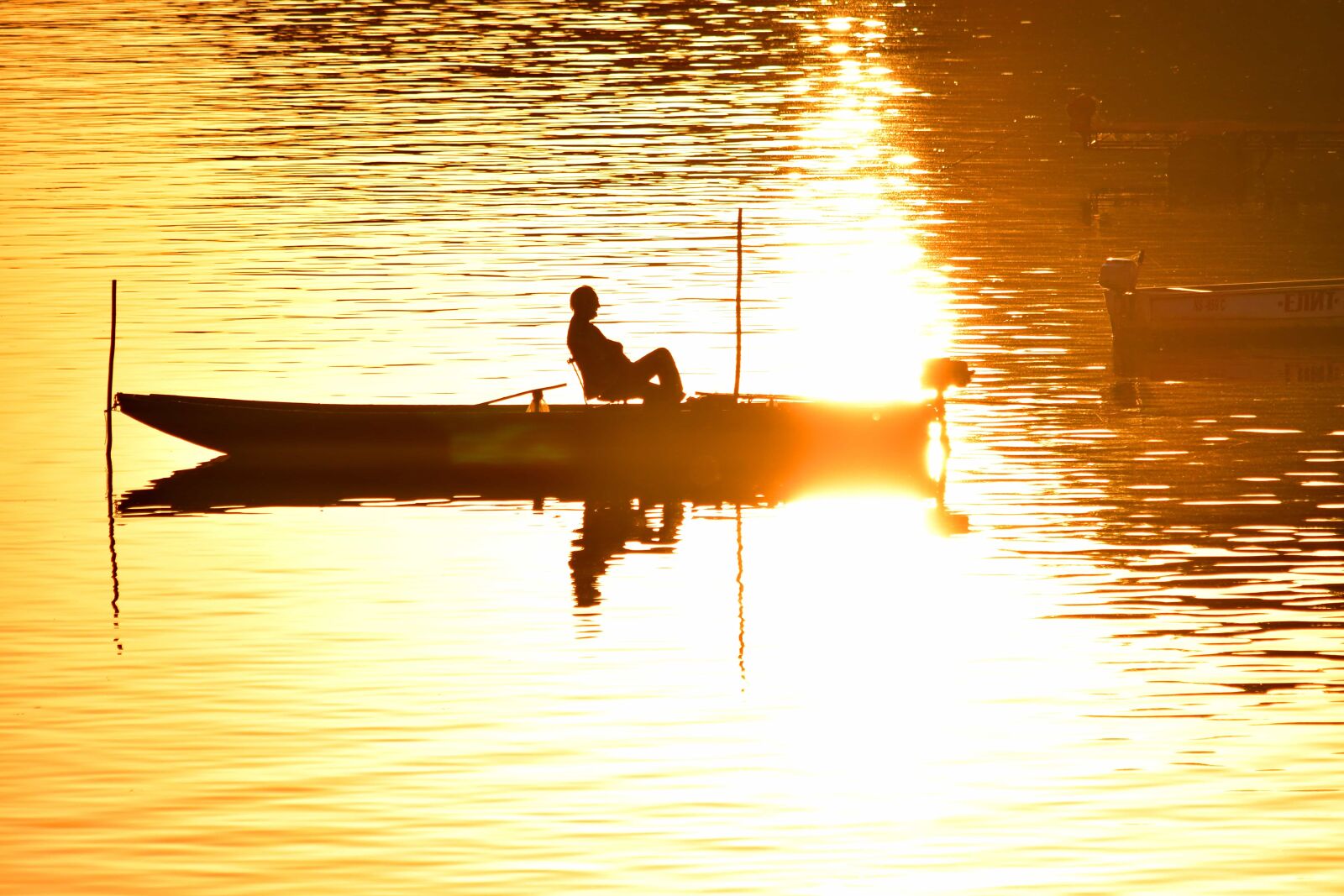 Nikon D5500 sample photo. Fisherman, orange yellow, silhouette photography