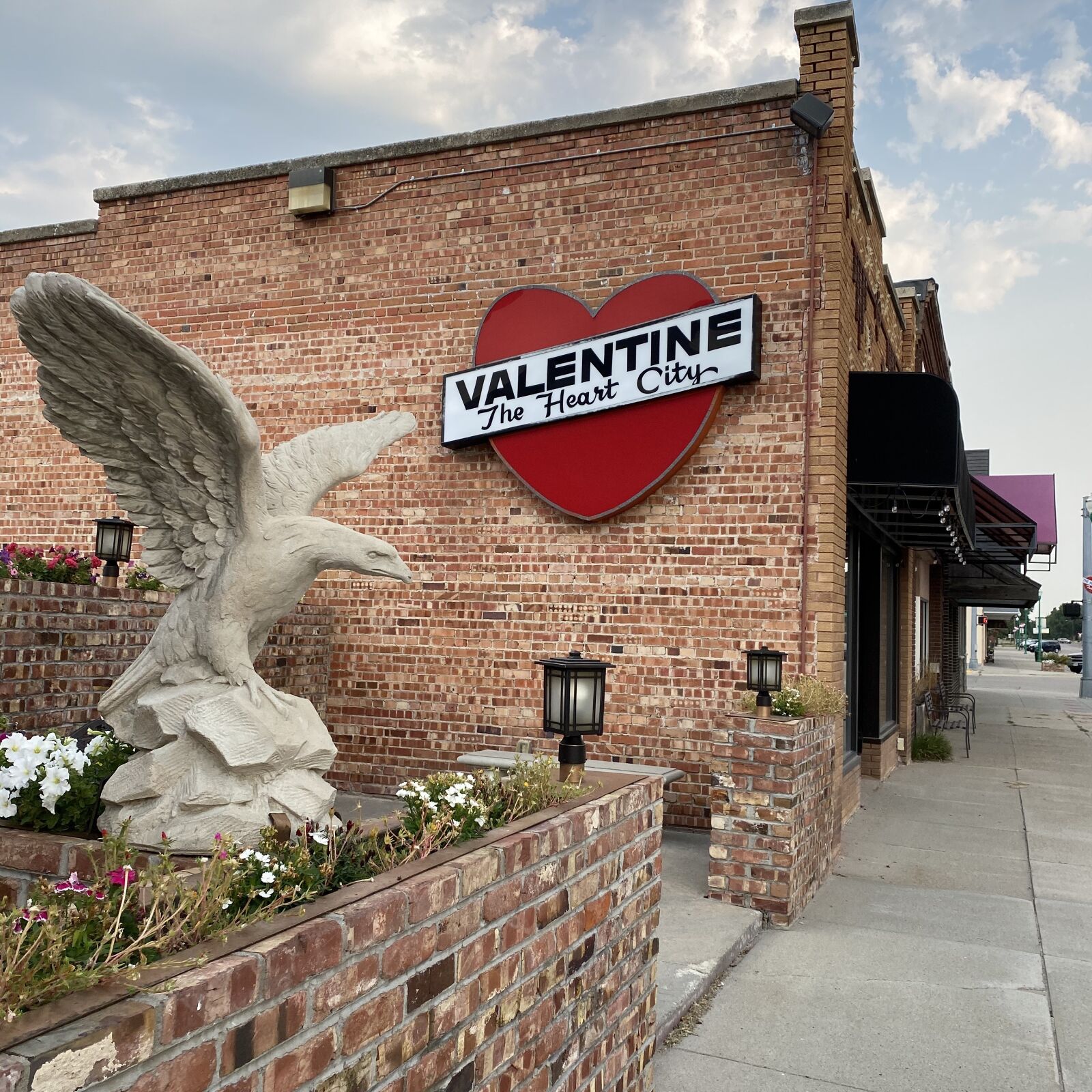 Apple iPhone 11 Pro Max sample photo. Heart city, eagle, sign photography