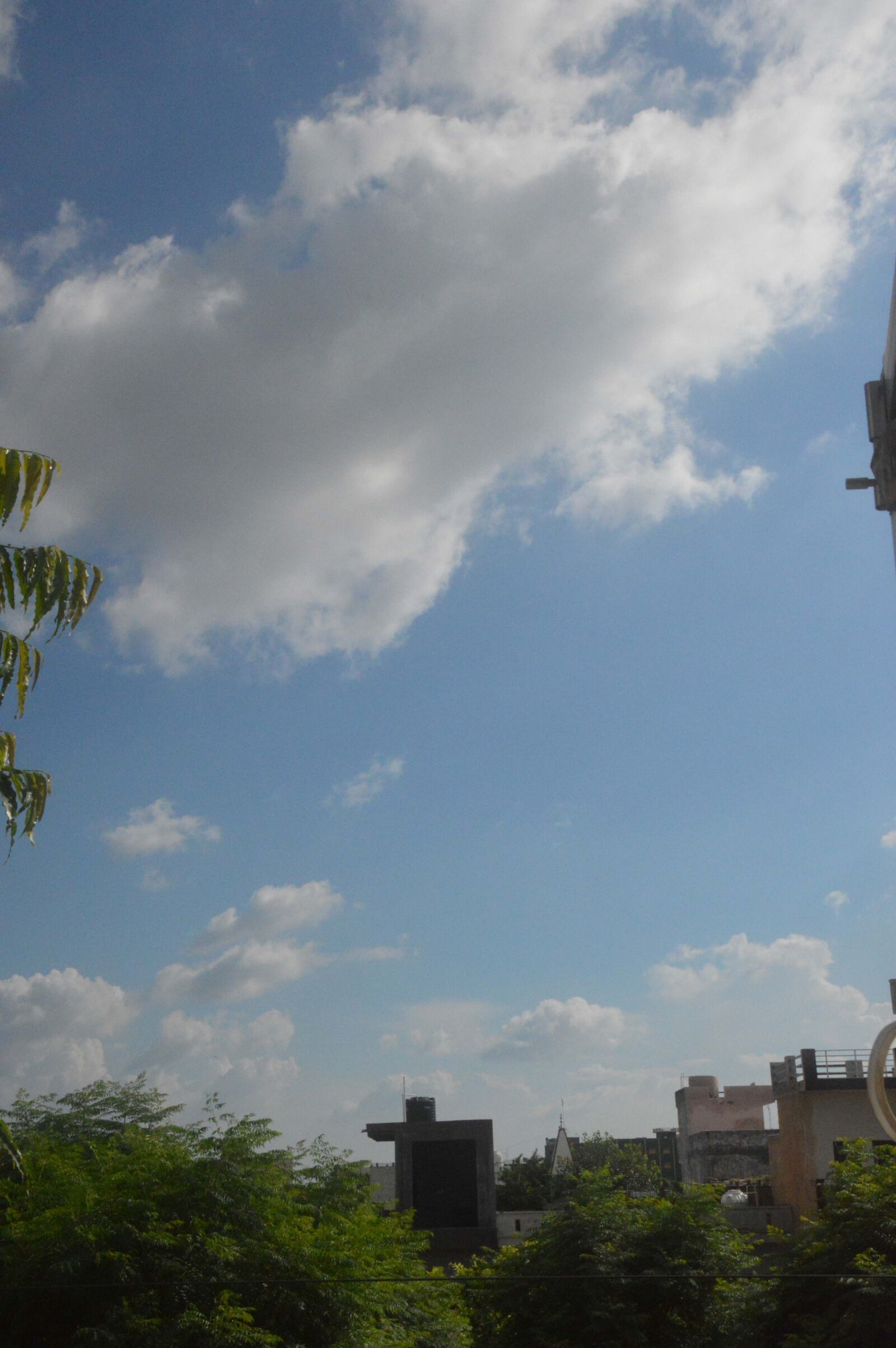 Nikon D3200 sample photo. Windows20, clouds, flying clouds photography