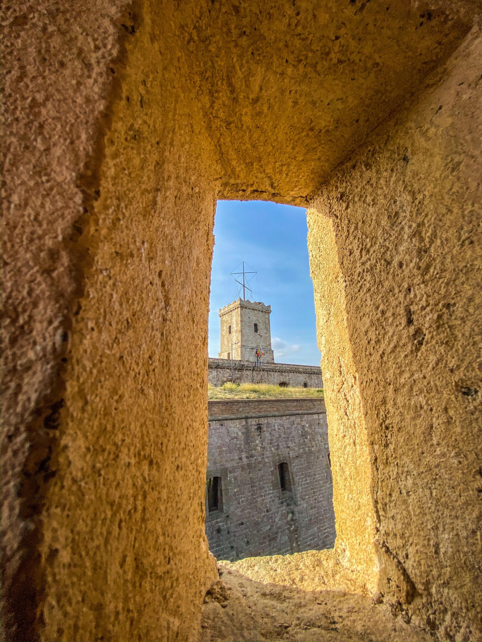 Apple iPhone 11 Pro + iPhone 11 Pro back triple camera 1.54mm f/2.4 sample photo. Barcelona, fortress, spain photography