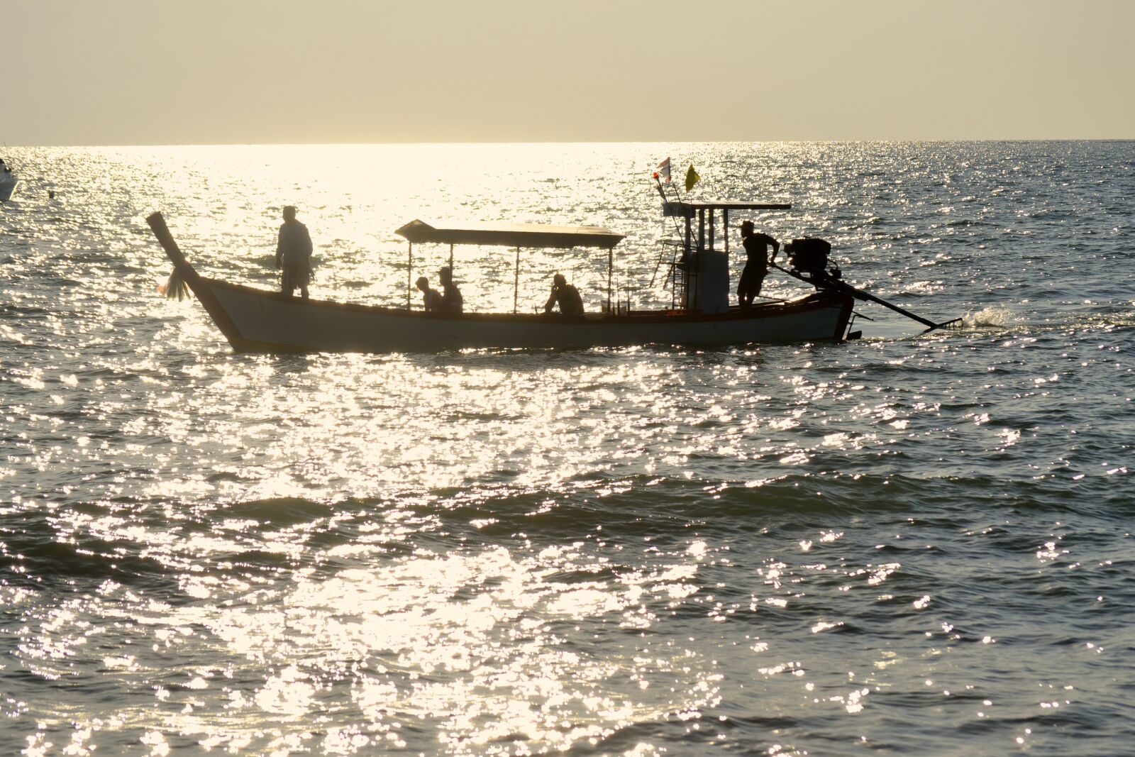 Nikon D3100 sample photo. Backlight, silhouette, boat photography