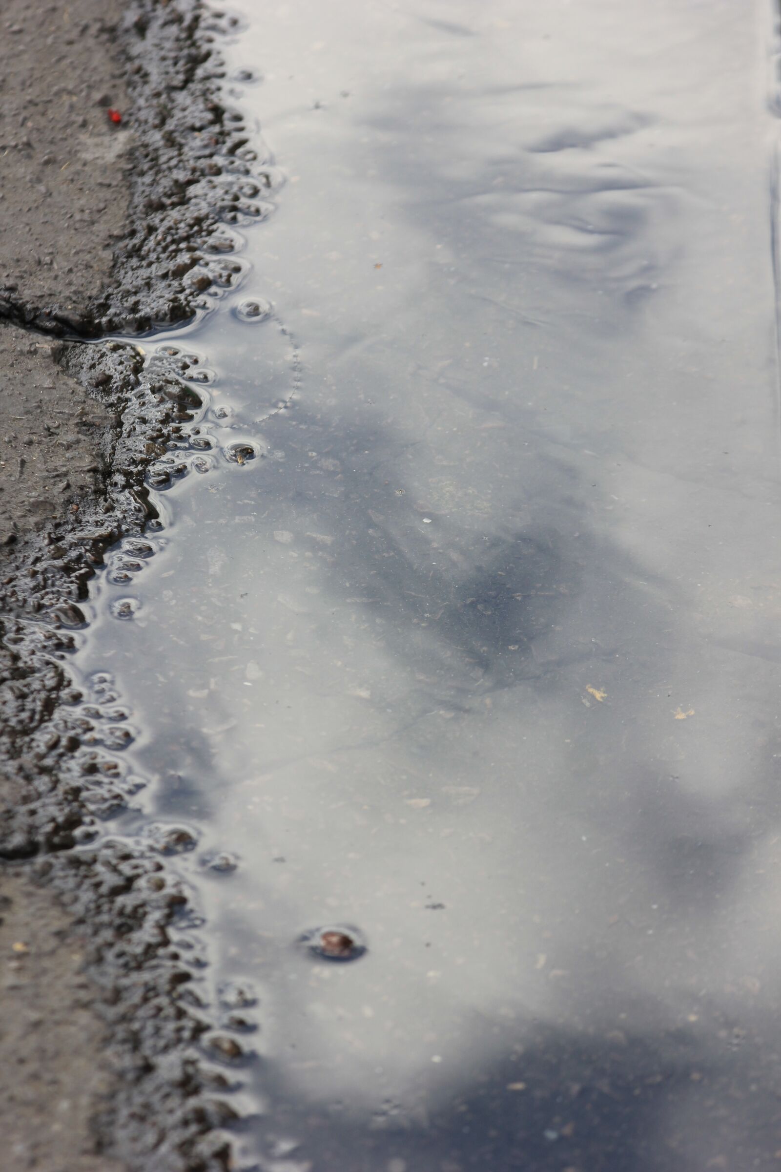 Canon EOS 550D (EOS Rebel T2i / EOS Kiss X4) sample photo. Sidewalk, rain, sky photography
