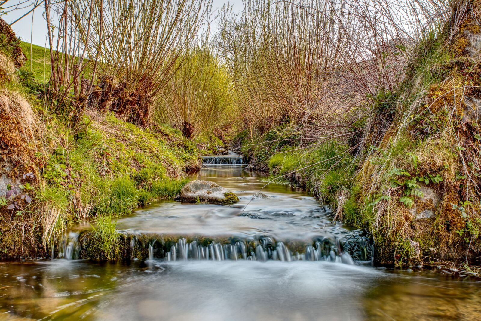 Canon EOS 6D Mark II sample photo. Stream bed, running water photography