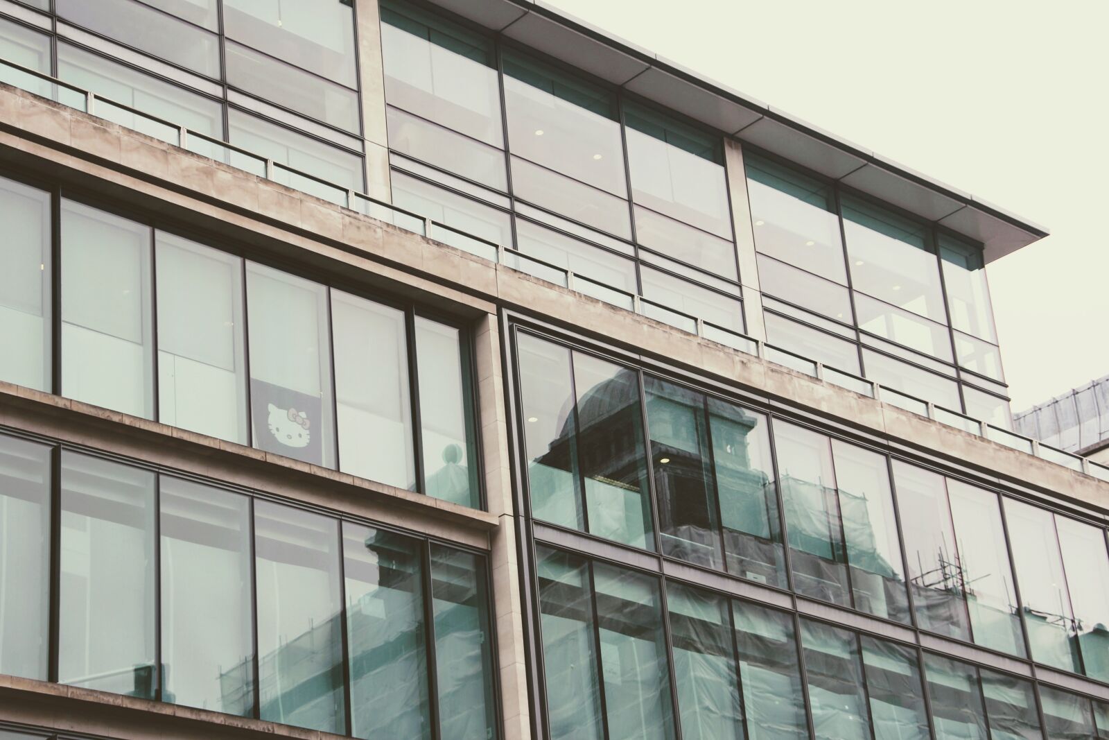 Canon EOS 60D sample photo. Glass facade, hello kitty photography