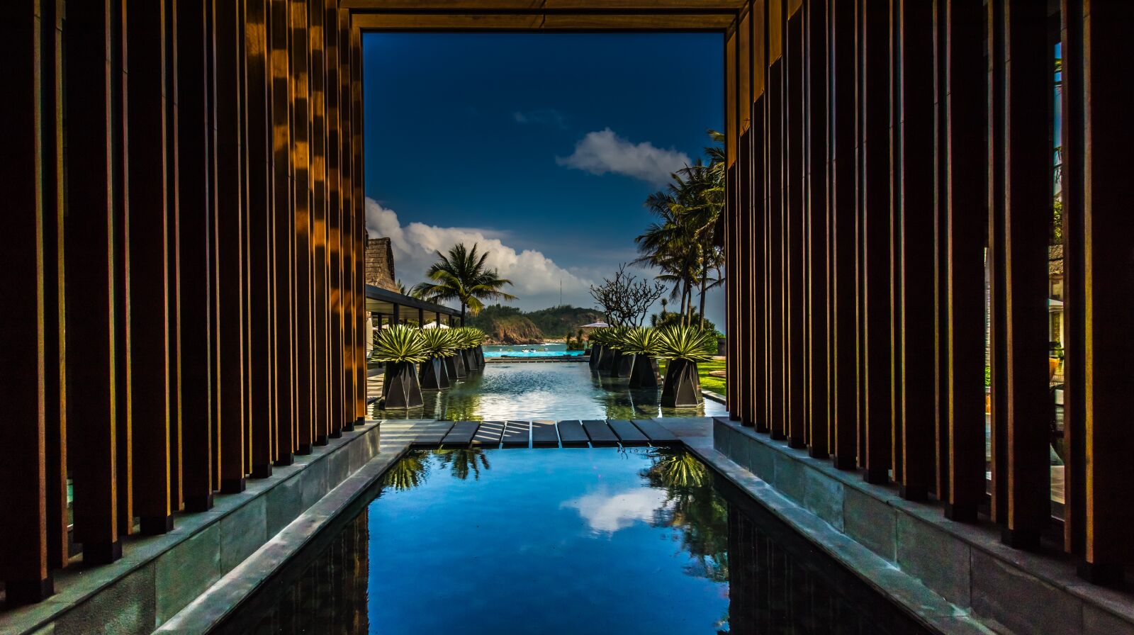 Sony SLT-A77 + 10-20mm F3.5 sample photo. Architecture, pool, hotel photography