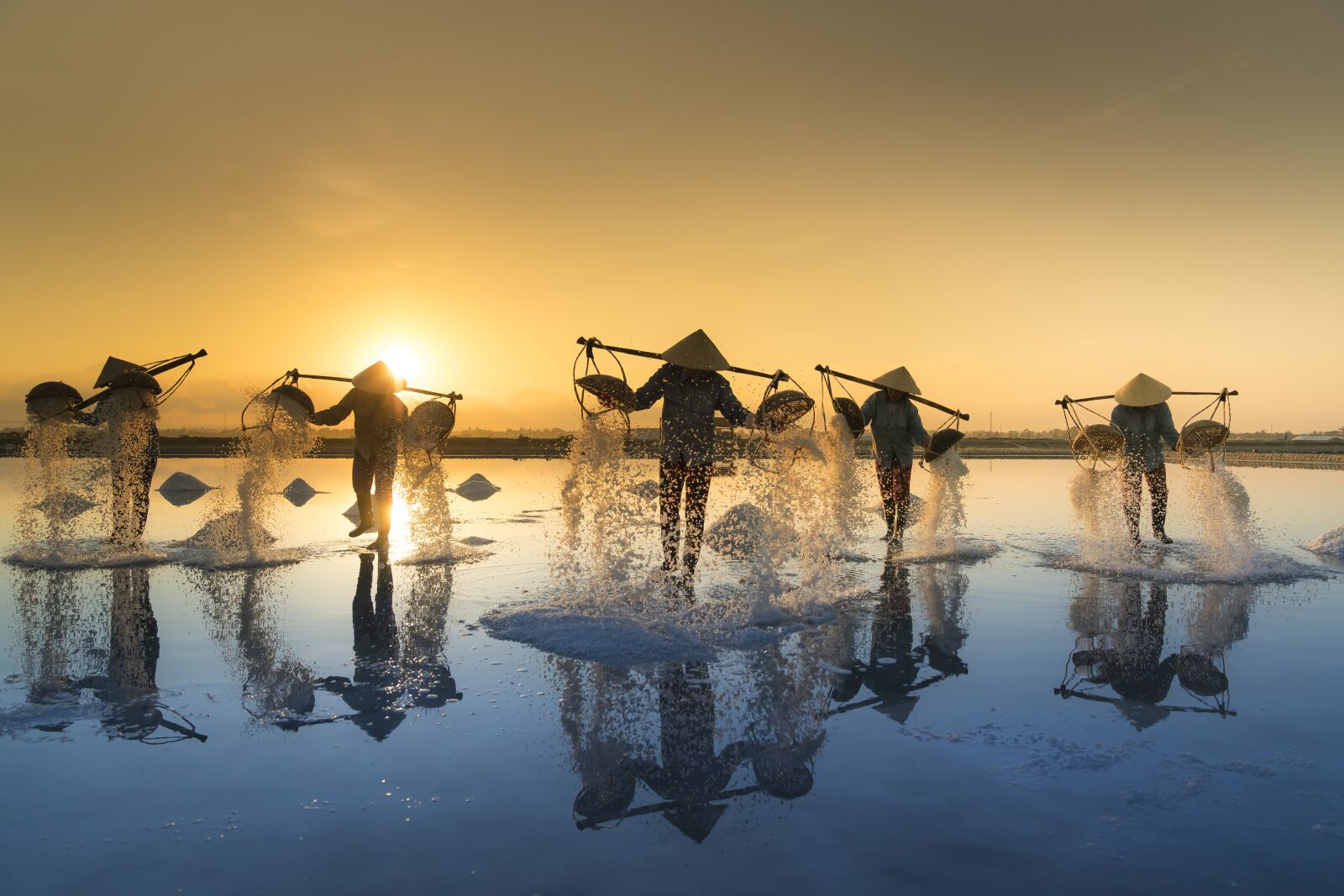Sony a7R II + Sony FE 24-70mm F2.8 GM sample photo. Salt harvesting, vietnam, water photography