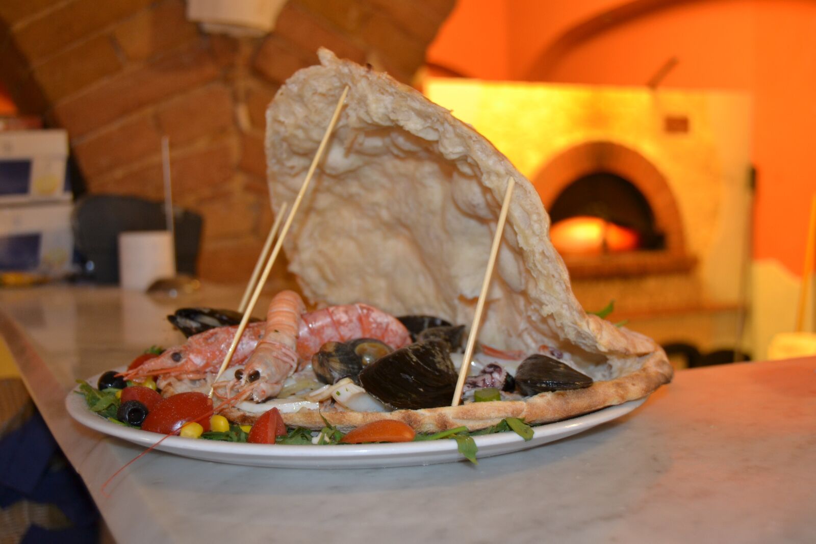 Nikon D3100 sample photo. Fish, pizza, conciglia photography