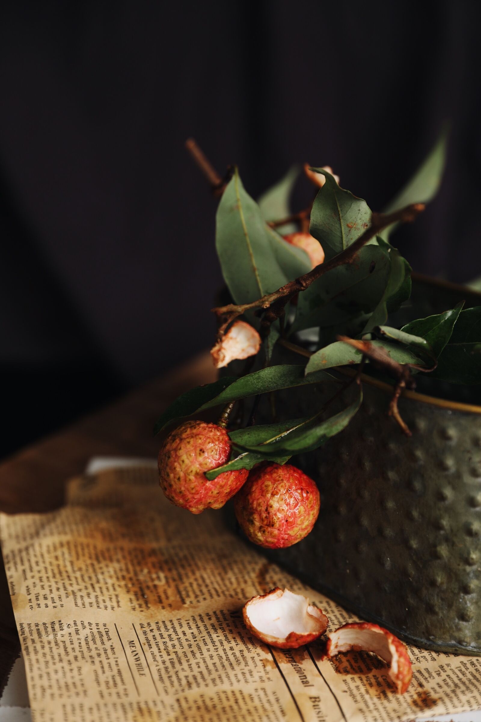 Canon EOS 5D Mark IV sample photo. Litchi, fruit, newspaper photography