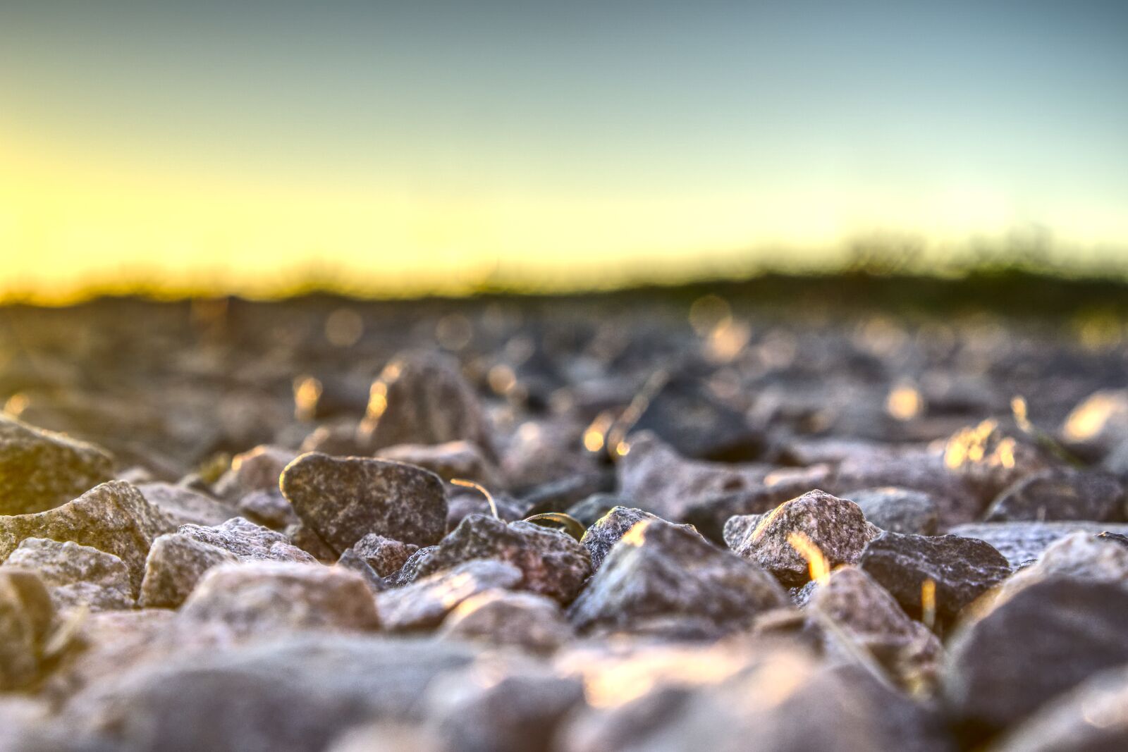 Sony a6000 + Sony E 35mm F1.8 OSS sample photo. Sunset, stones, gravel photography