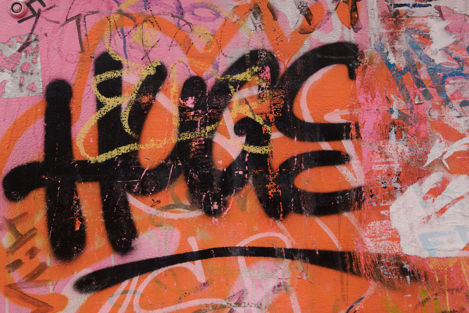 OM System OM-1 Mark II sample photo. Hugs graffiti photography