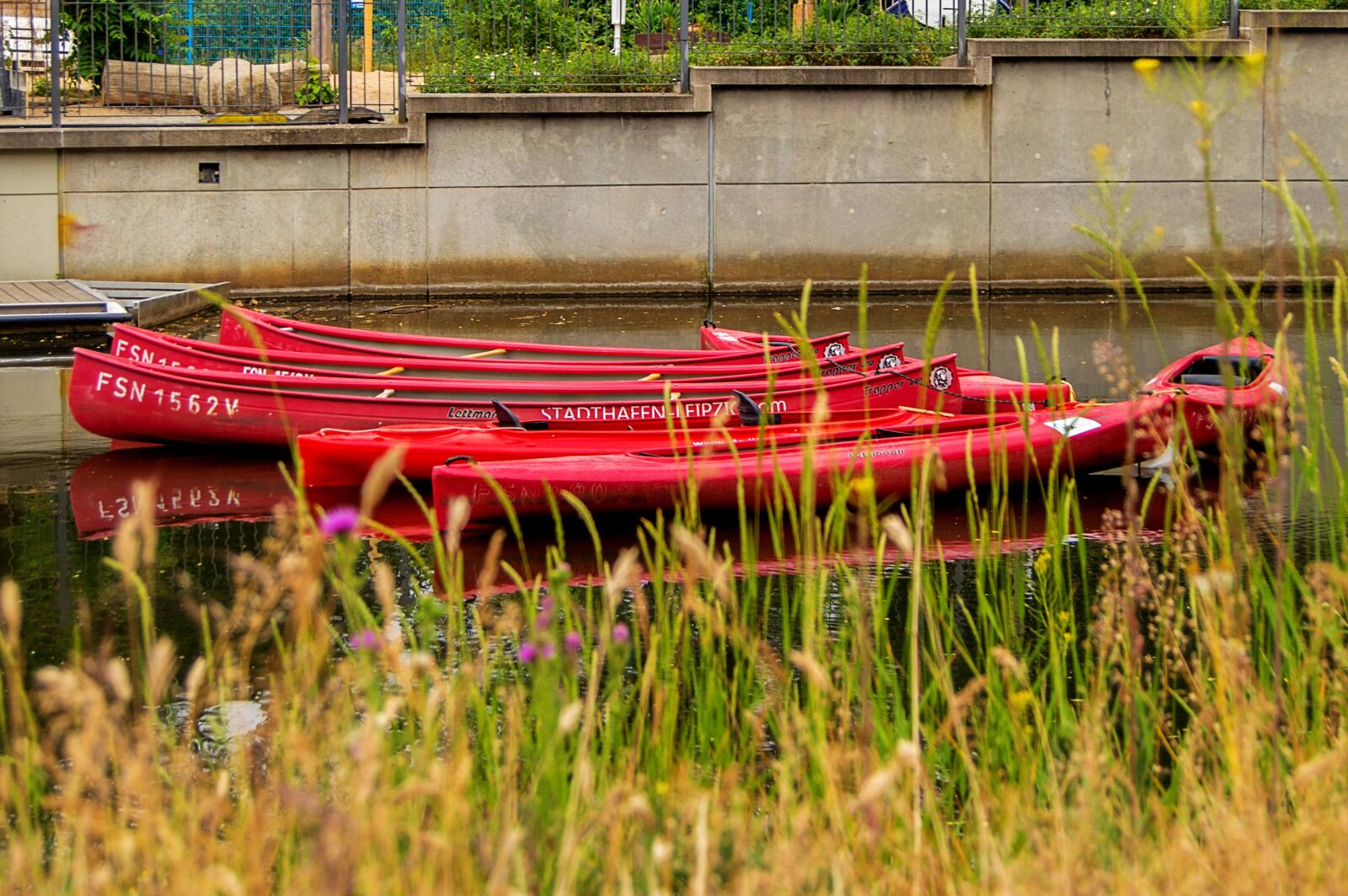 Nikon D3200 sample photo. Leipzig, canoeing, red photography