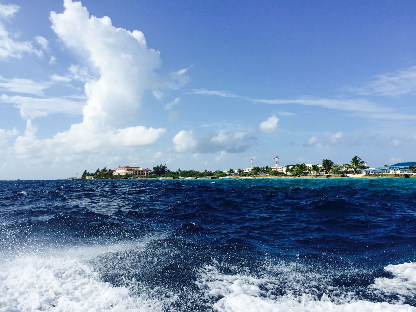 Apple iPhone 6 sample photo. Water, water boat, island photography