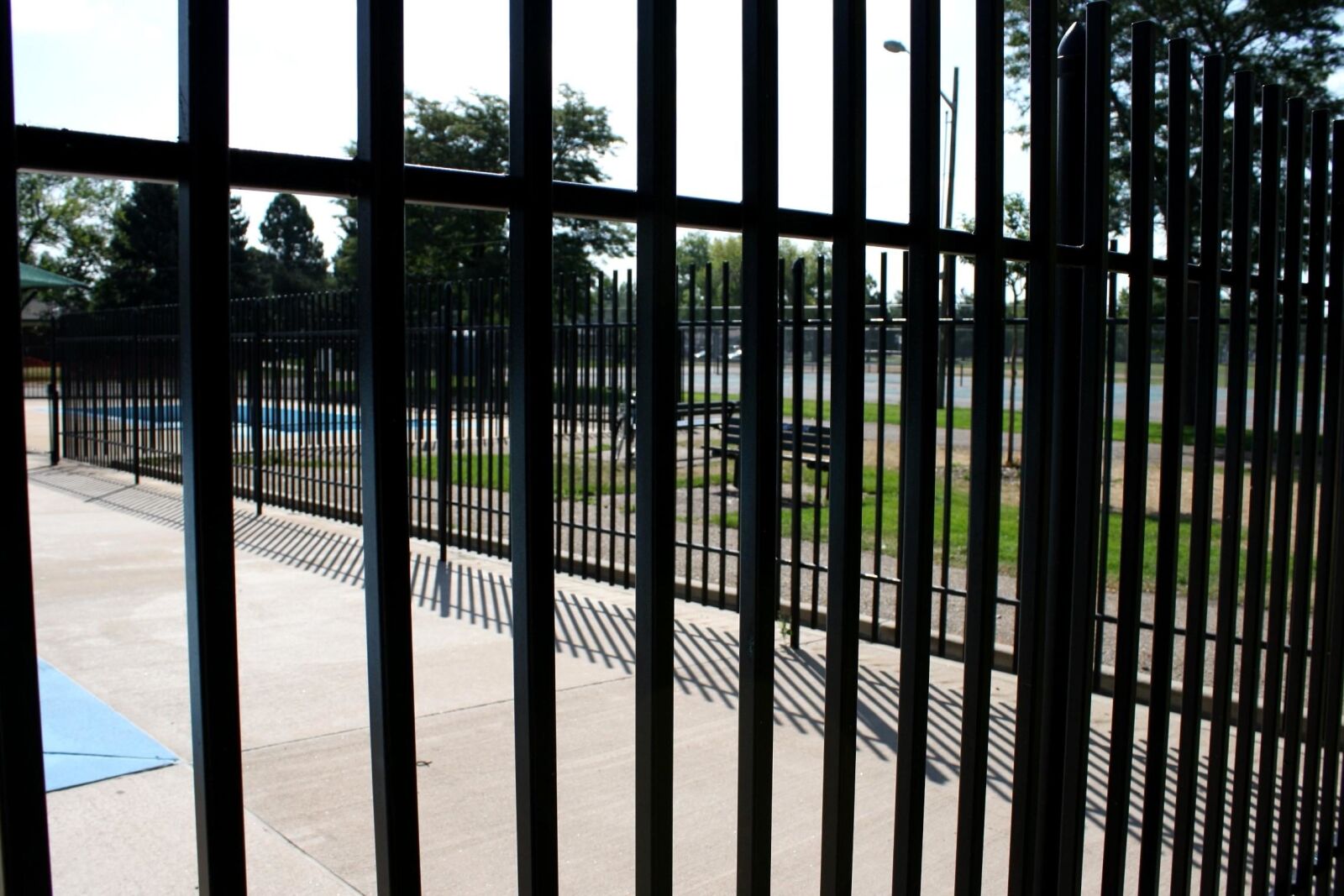 f/3.5-5.6 IS sample photo. Metal bars, metal fence photography
