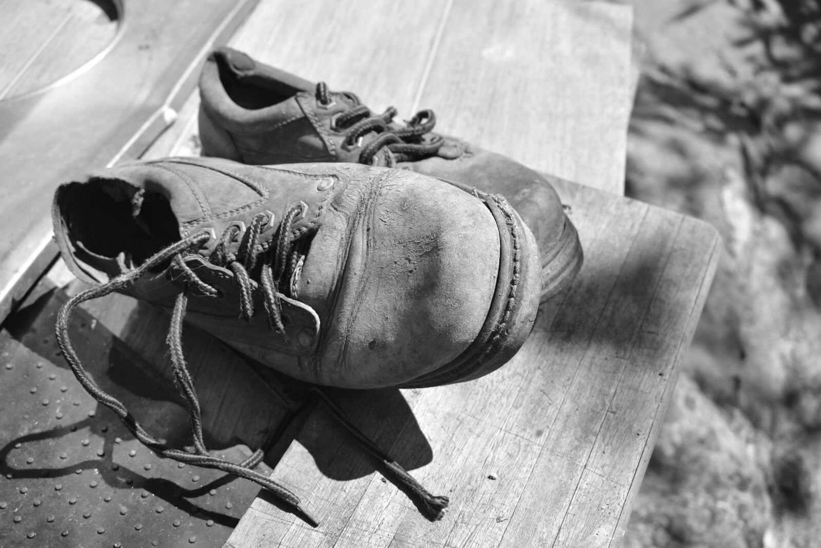 Nikon D5500 sample photo. Worn shoes, black and photography