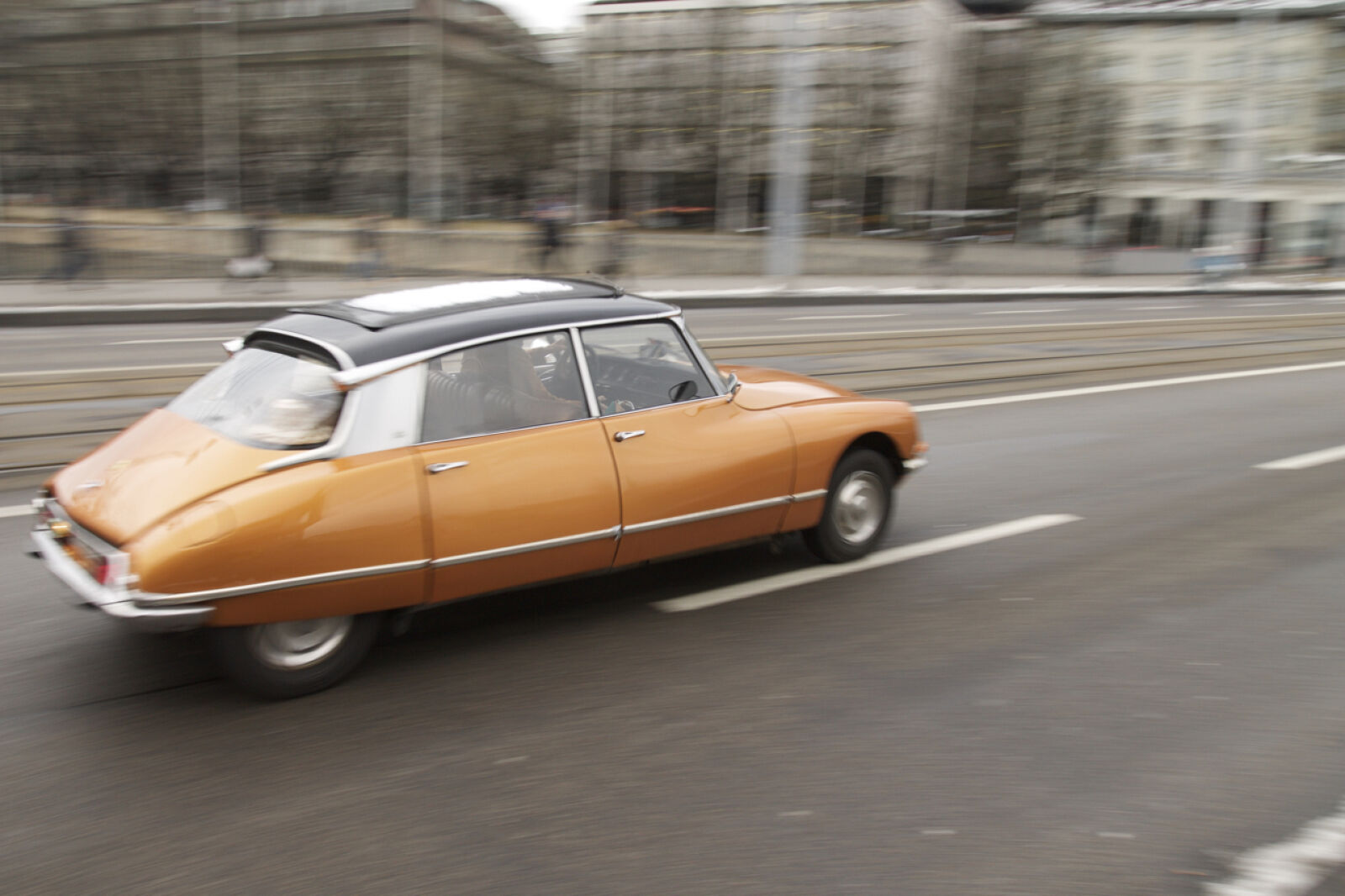 Sigma 18-35mm f/1.8 DC HSM sample photo. Auto, beige, blur, bridge photography