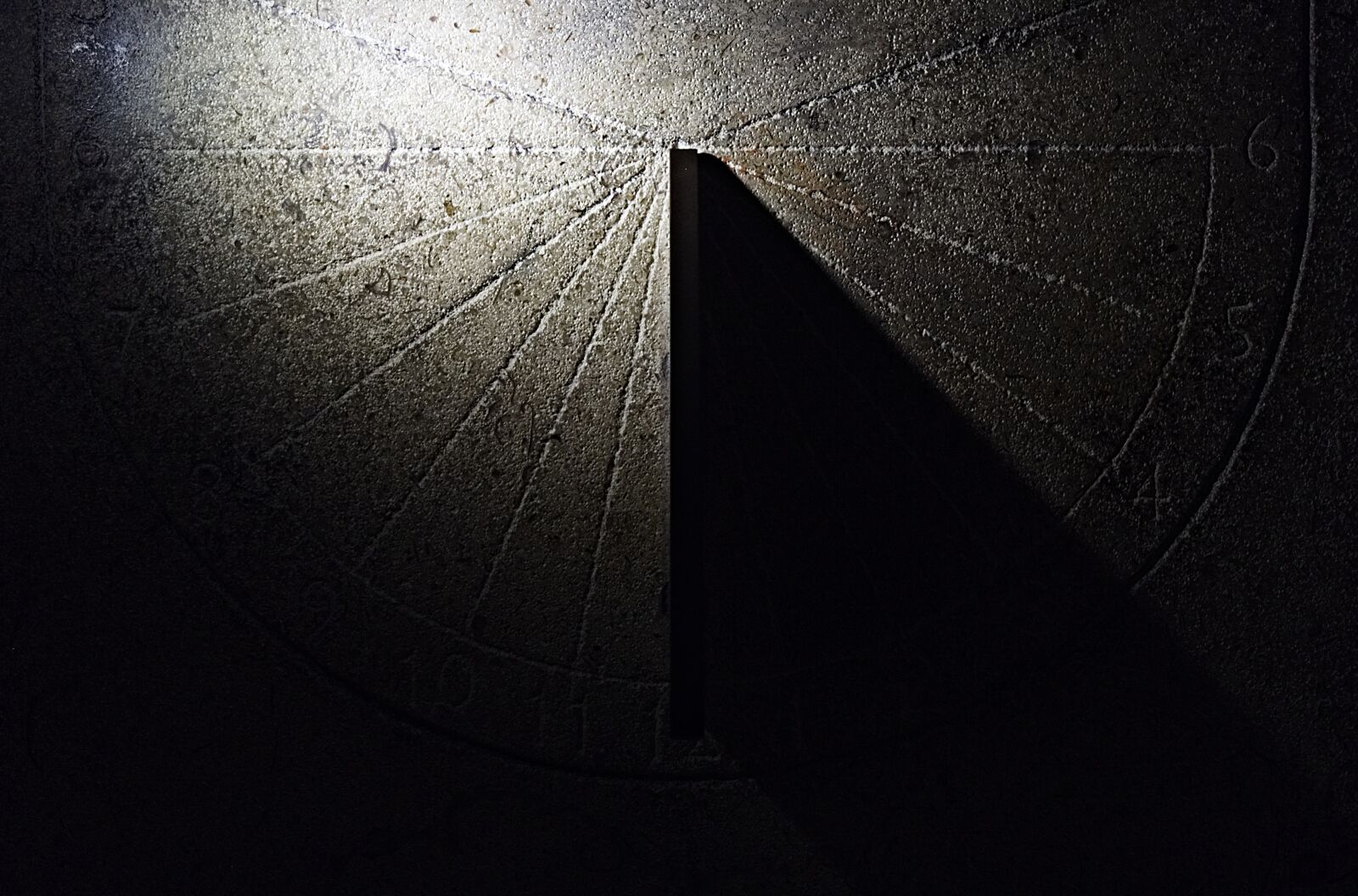 Olympus M.Zuiko Digital ED 12-40mm F2.8 Pro sample photo. Sundial, shadow, stone photography