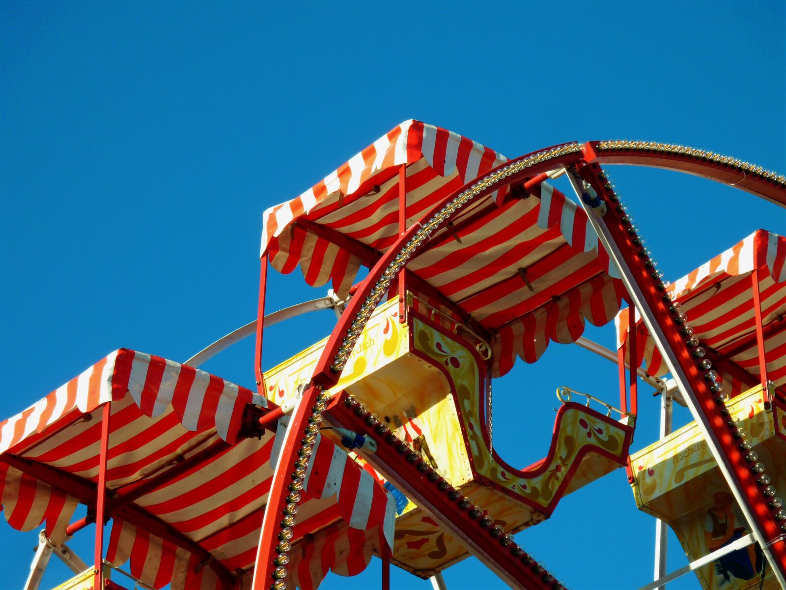 Panasonic DMC-TZ7 sample photo. Carousel, chain carousel, fair photography