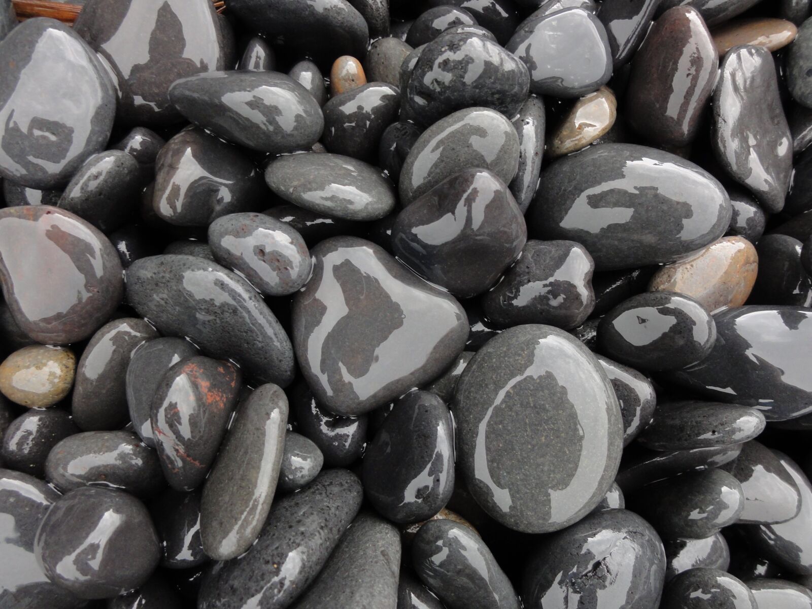 Sony DSC-HX5V sample photo. Boulders, background, structure photography