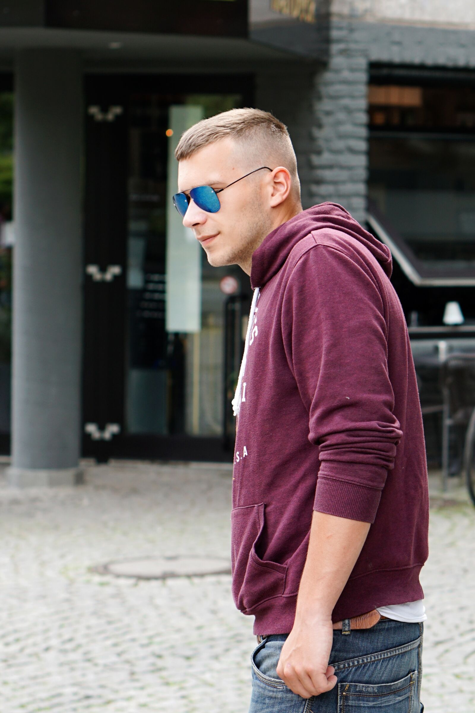 E 50mm F1.8 OSS sample photo. Man, sunglasses, cologne photography