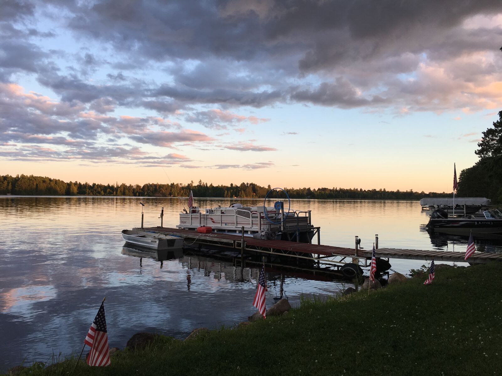 Apple iPhone 6s sample photo. Sunset, pontoon boat, dock photography