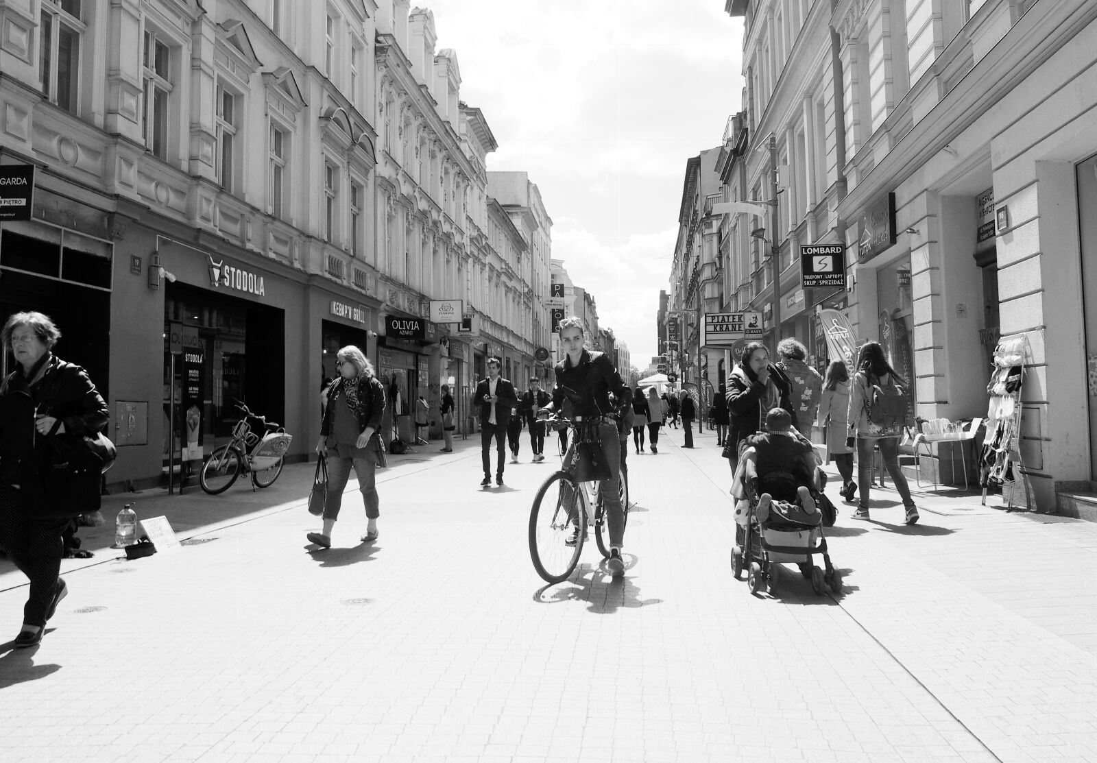 Olympus PEN E-PL6 sample photo. People, cyclist, black and photography