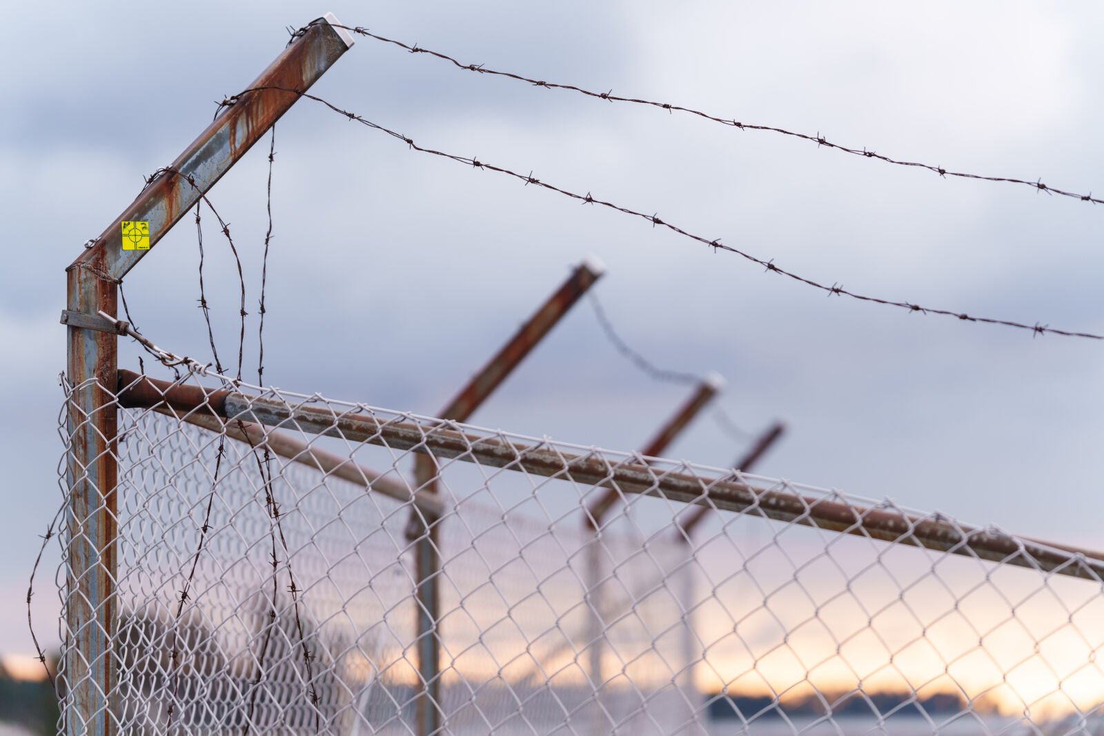 Sigma 70-200mm F2.8 DG DN OS | Sports sample photo. Barbed wire fence photography