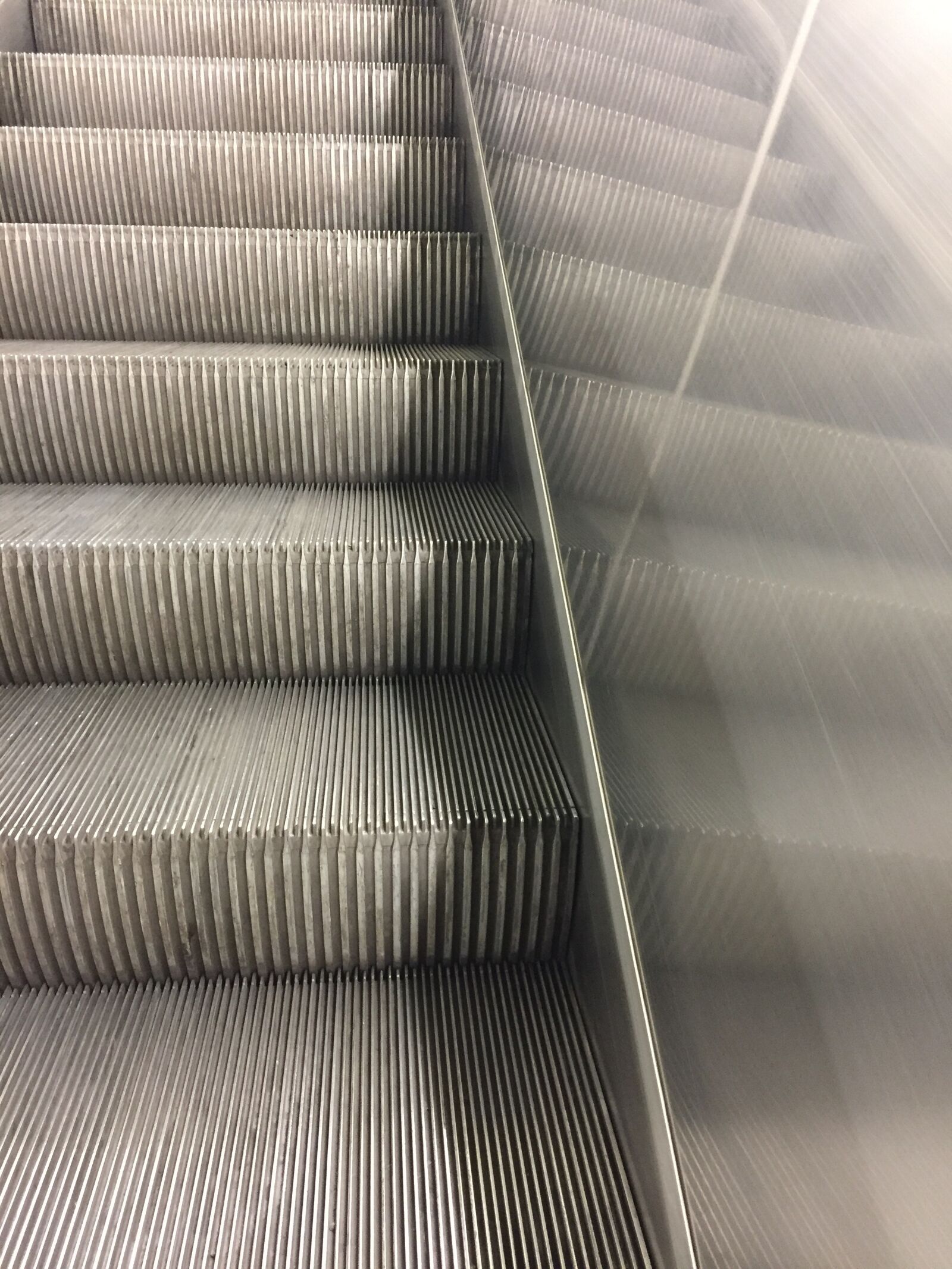iPhone 6 back camera 4.15mm f/2.2 sample photo. Escalator, stairs, railway station photography