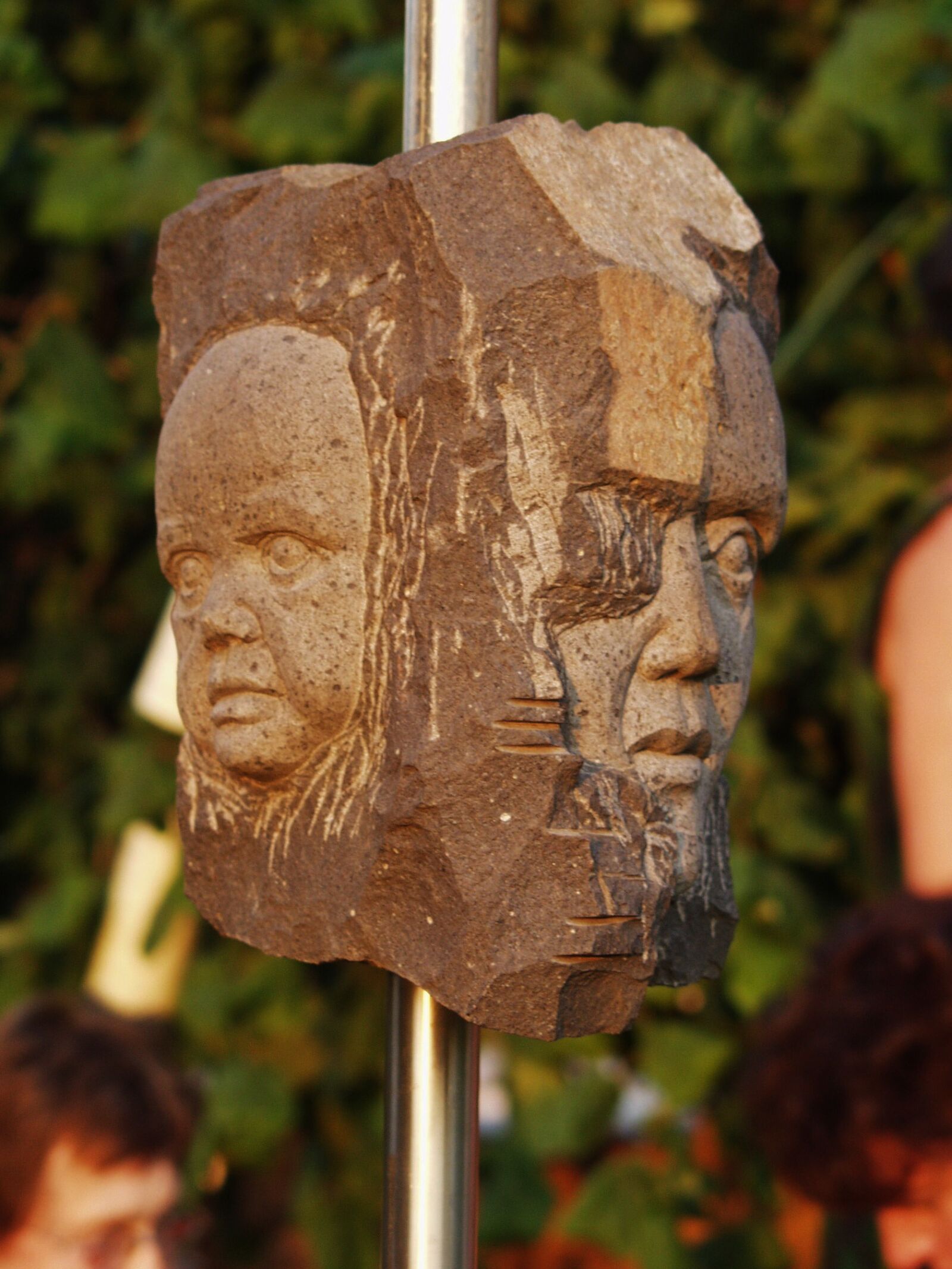 Olympus E-10 sample photo. Art, stone heads, faces photography